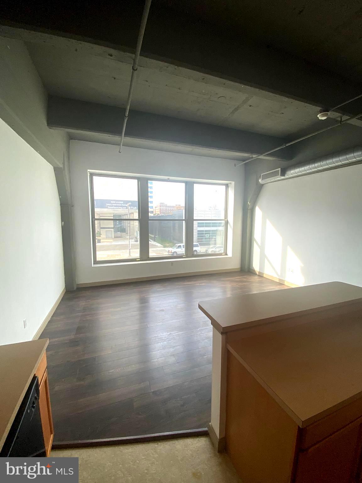 511 North Broad Street, Unit 202 Philadelphia, PA 19123 - Photo 21 of 29 a view of a room with window and kitchen space