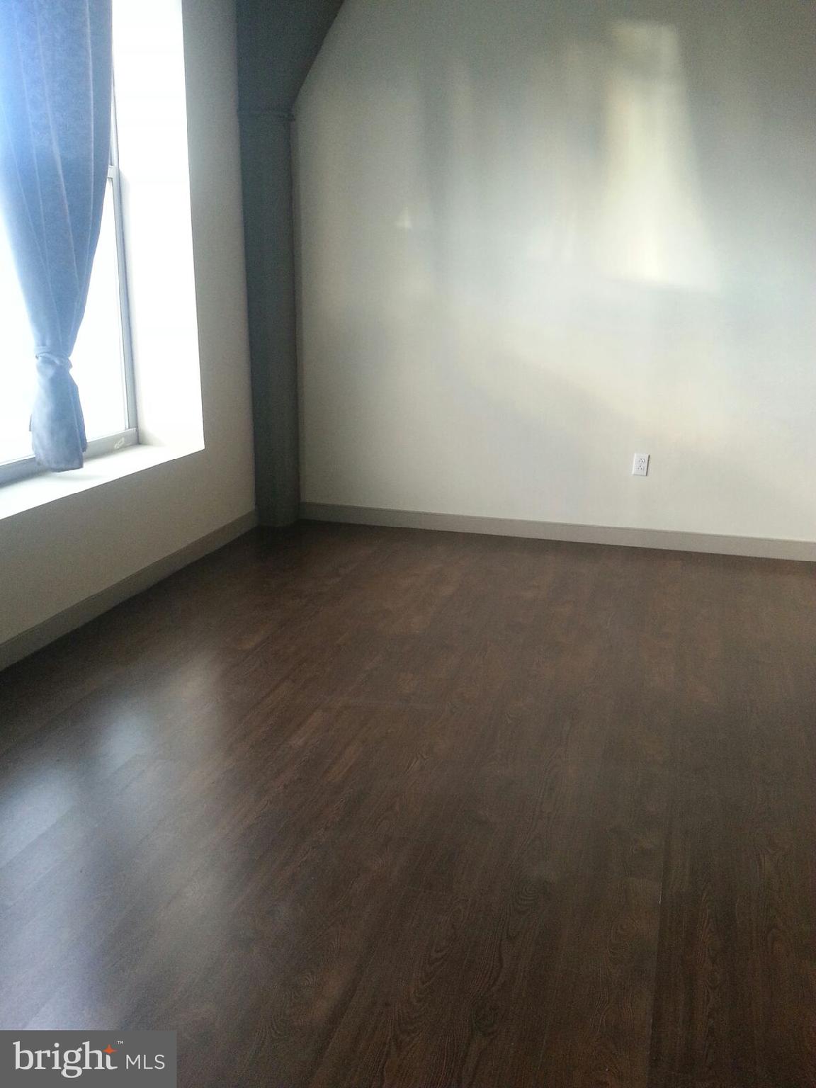 511 North Broad Street, Unit 202 Philadelphia, PA 19123 - Photo 26 of 29 an empty room with a window