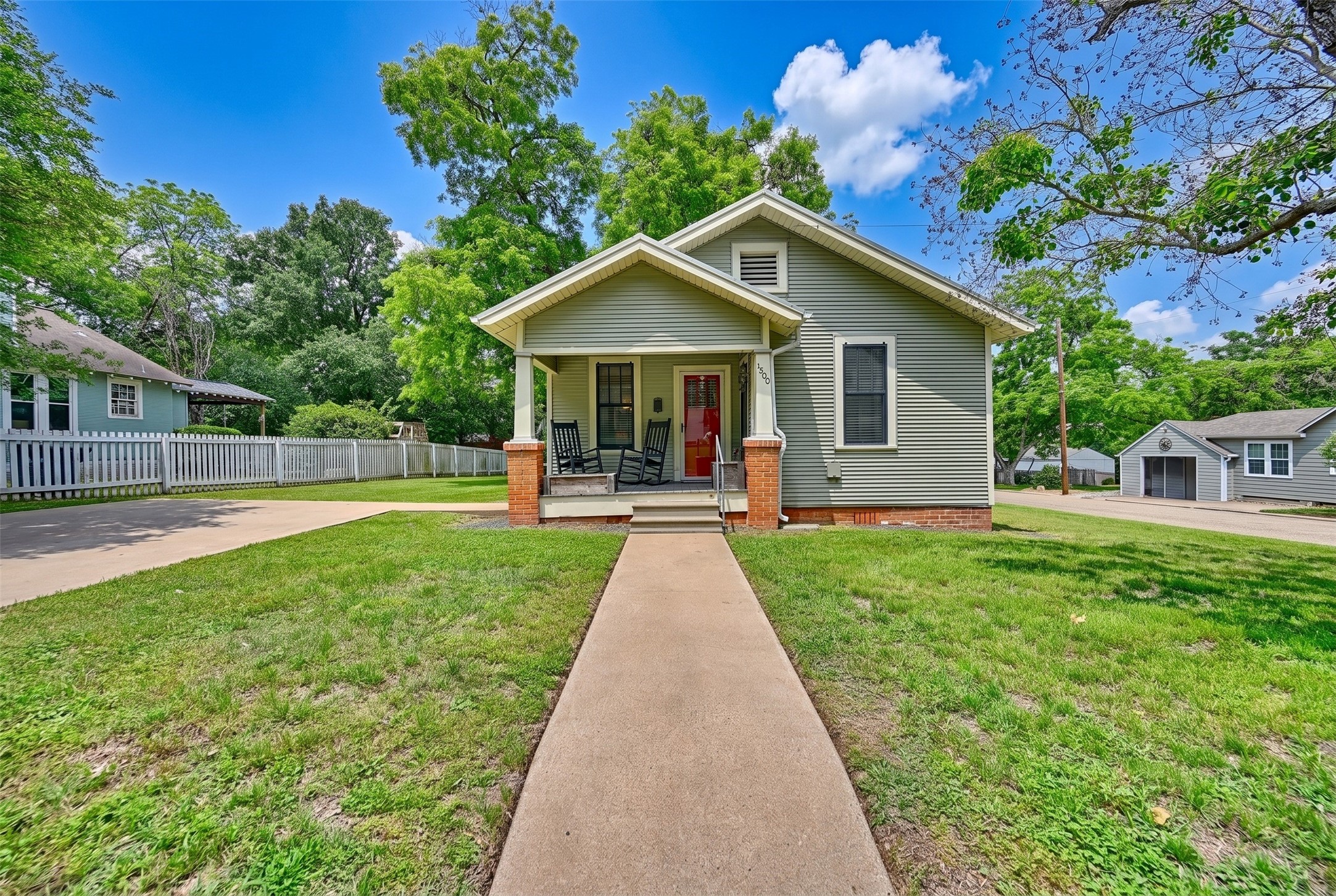 1500 Church Street Brenham, TX 77833 - Photo 1 of 30 a view of a house with a yard