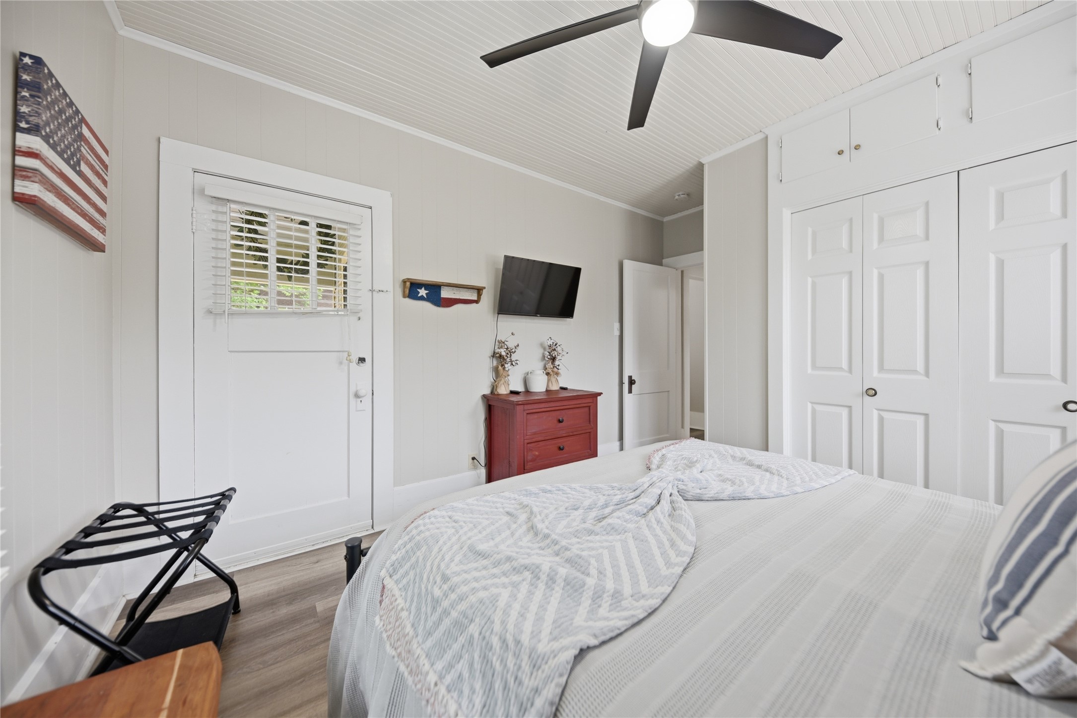 1500 Church Street Brenham, TX 77833 - Photo 15 of 30 a bedroom with a bed and a television