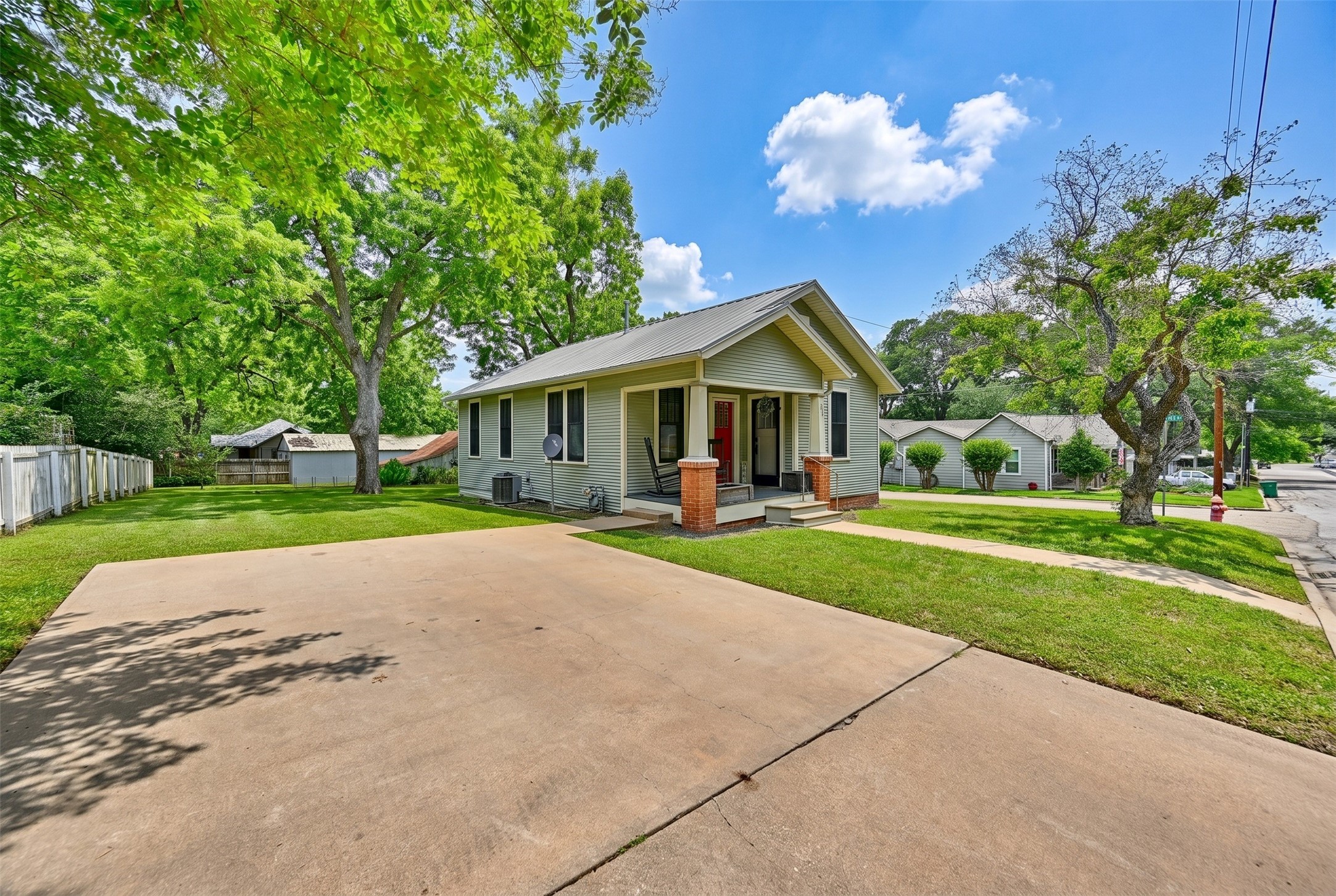 1500 Church Street Brenham, TX 77833 - Photo 2 of 30 a view of a house with a yard