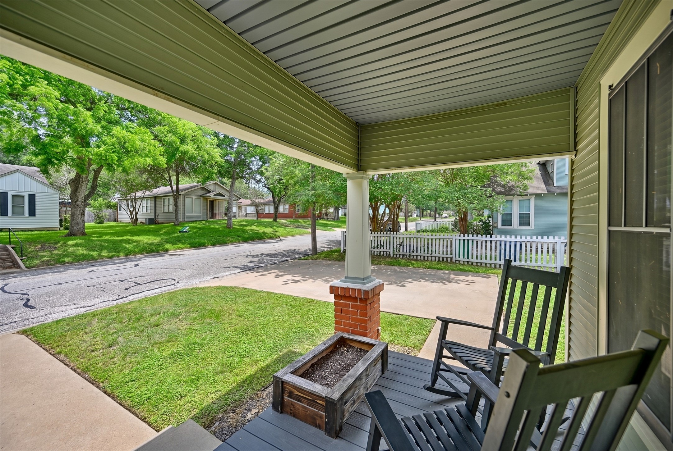 1500 Church Street Brenham, TX 77833 - Photo 4 of 30 a view of a patio with a table chairs and a backyard