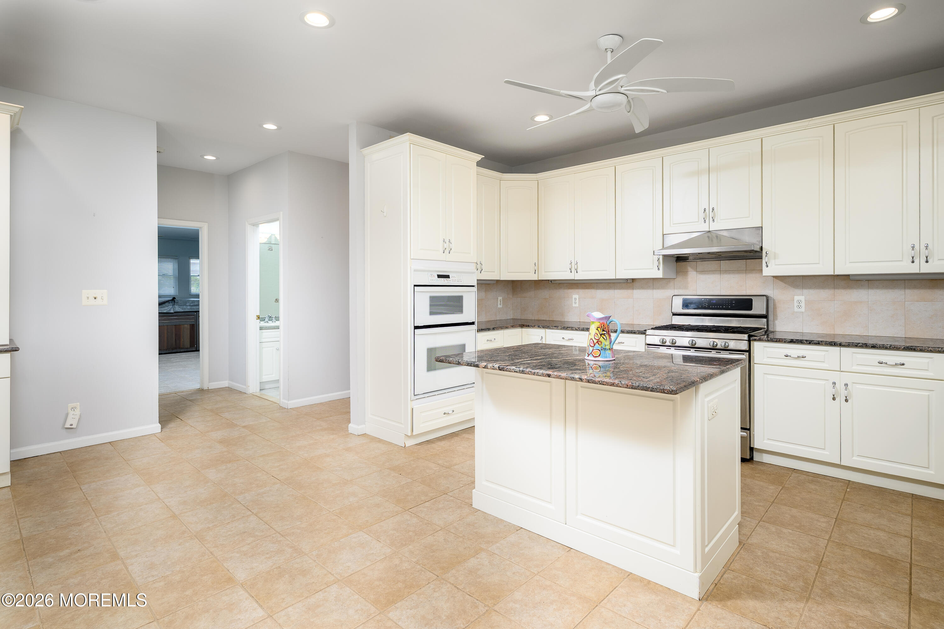 805 Front Street Union Beach, NJ 07735 - Photo 13 of 65 a kitchen with stainless steel appliances granite countertop a stove a sink and a refrigerator