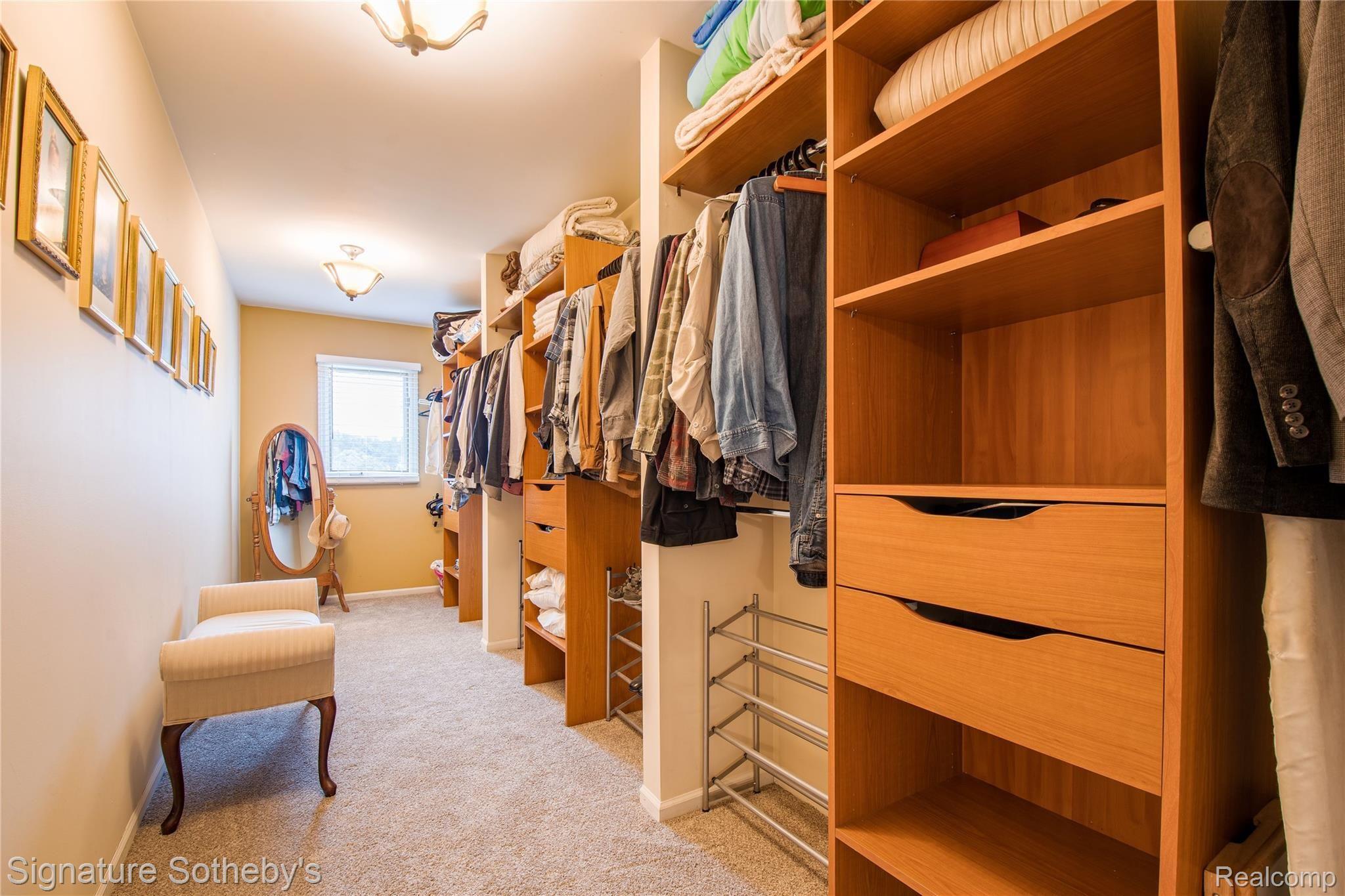 745 West Ridge Court Lake Orion, MI 48359 - Photo 24 of 44 master bedroom walk in closet