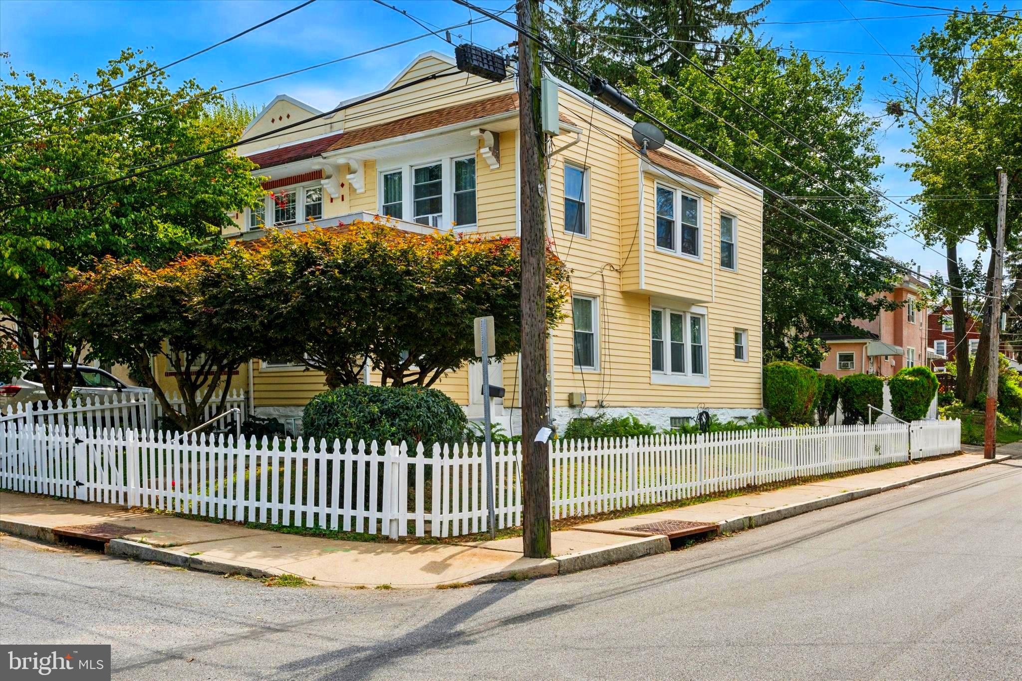124 Arnold Road Ardmore, PA 19003 - Photo 1 of 24 a view of a porch with a fence