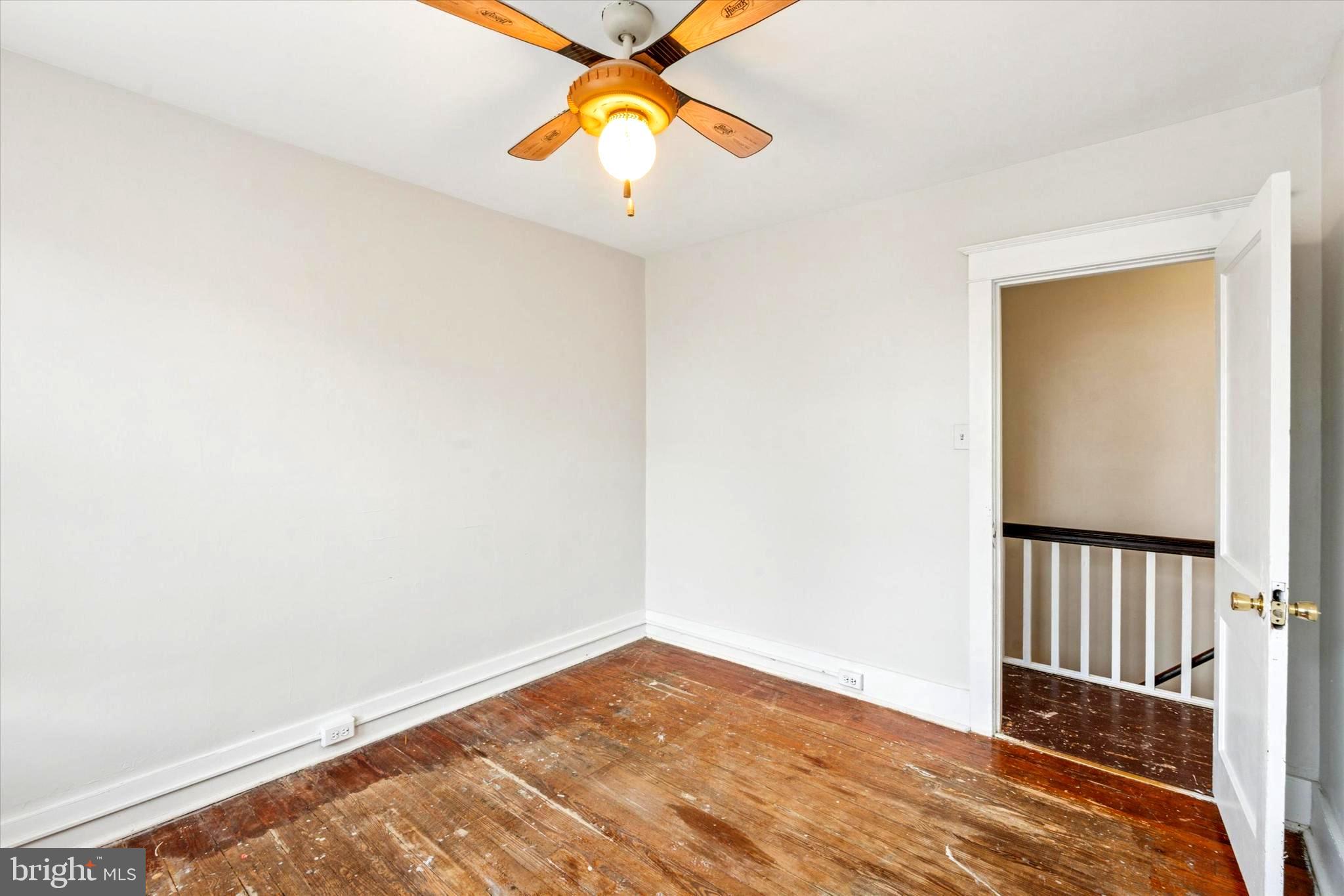 124 Arnold Road Ardmore, PA 19003 - Photo 13 of 24 a view of a room with wooden floor and windows