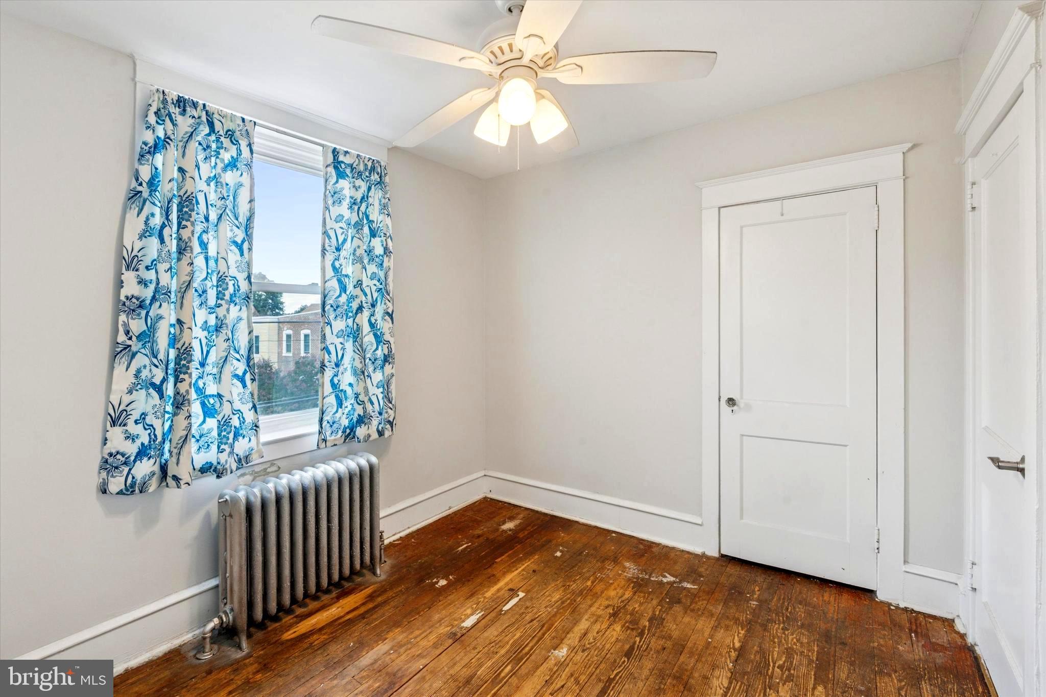 124 Arnold Road Ardmore, PA 19003 - Photo 16 of 24 wooden floor in an empty room with a window