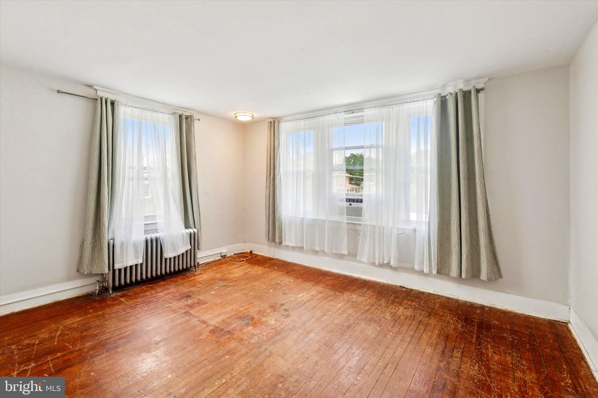 124 Arnold Road Ardmore, PA 19003 - Photo 18 of 24 a view of an empty room and window