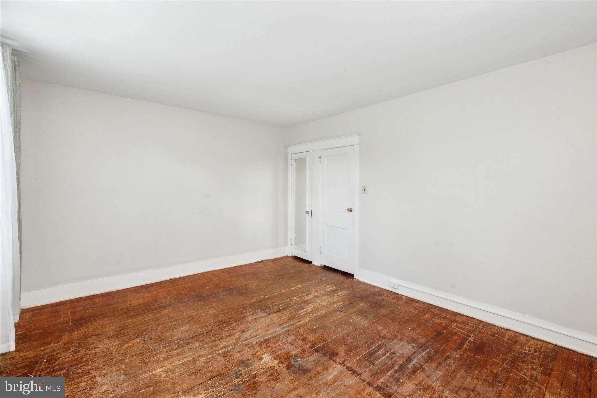 124 Arnold Road Ardmore, PA 19003 - Photo 21 of 24 an empty room with an entryway
