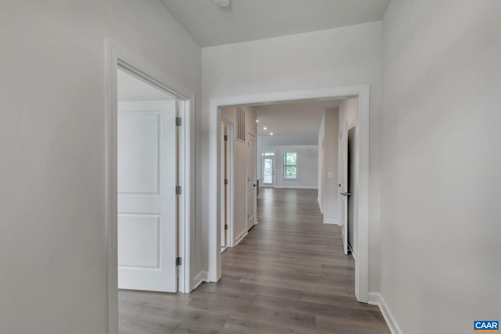 106 Cliffstone Boulevard Charlottesville, VA 22911 - Photo 2 of 29 a view of a hallway with wooden floor