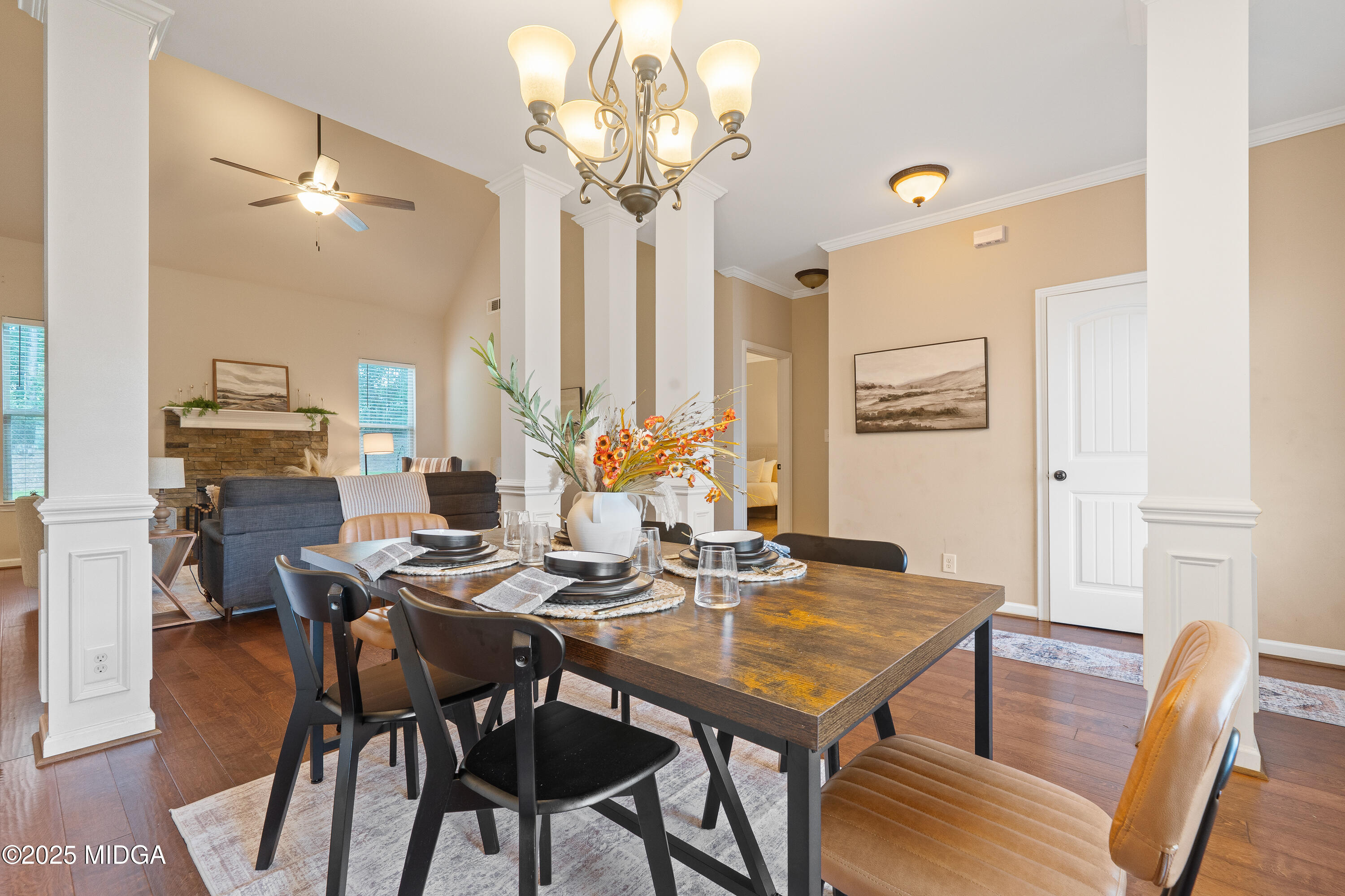 318 Walnut Grove Road Gray, GA 31032 - Photo 8 of 39 a view of a dining room with furniture and wooden floor