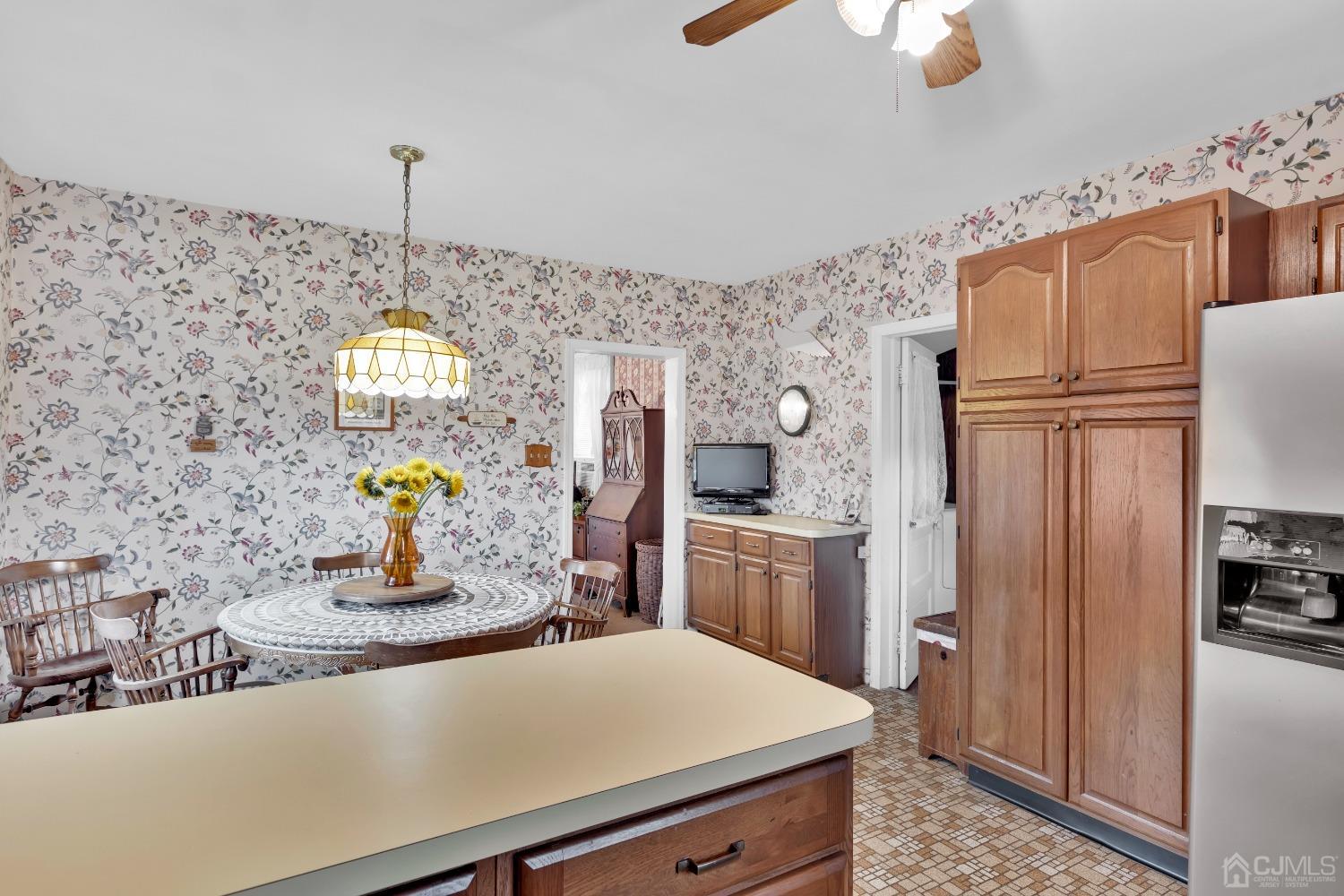 184 Creek Road Keansburg, NJ 07734 - Photo 11 of 29 a kitchen with stainless steel appliances a refrigerator and a stove