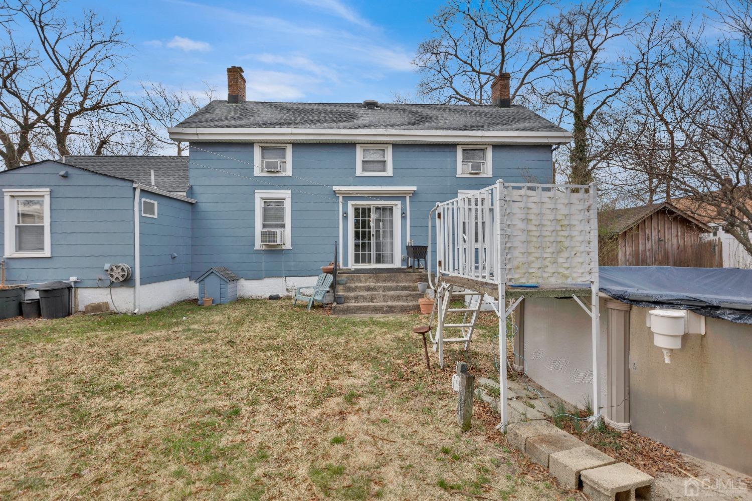 184 Creek Road Keansburg, NJ 07734 - Photo 21 of 29 a front view of a house with a yard