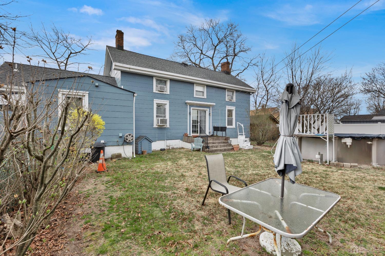 184 Creek Road Keansburg, NJ 07734 - Photo 22 of 29 a backyard of a house with seating space