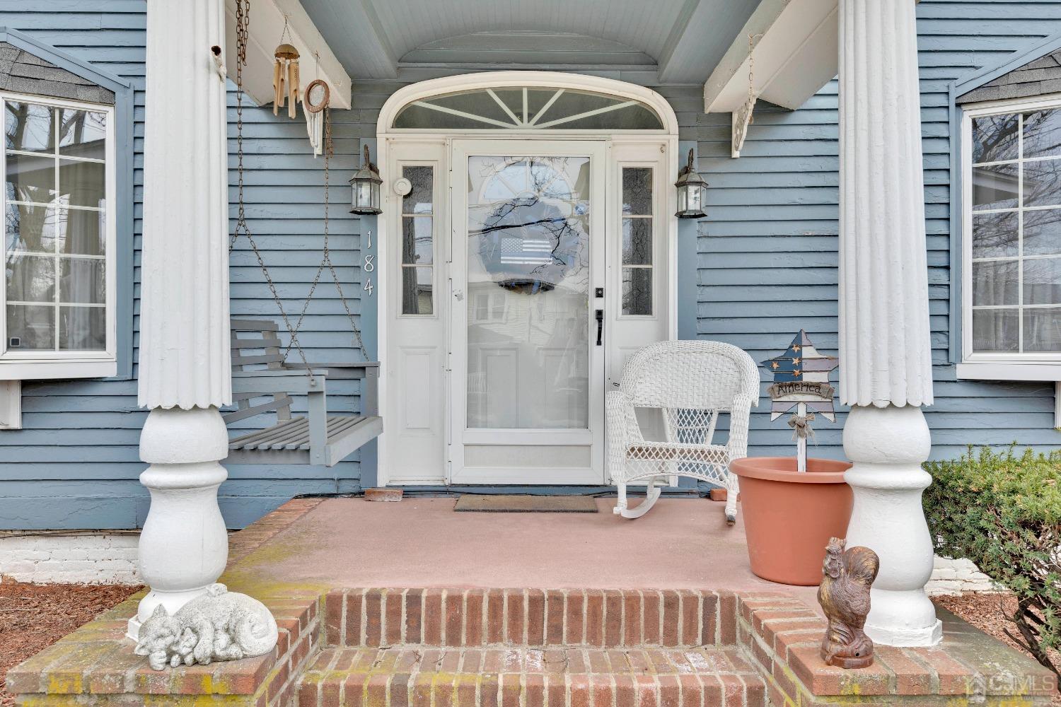 184 Creek Road Keansburg, NJ 07734 - Photo 3 of 29 a front view of a house with outdoor seating