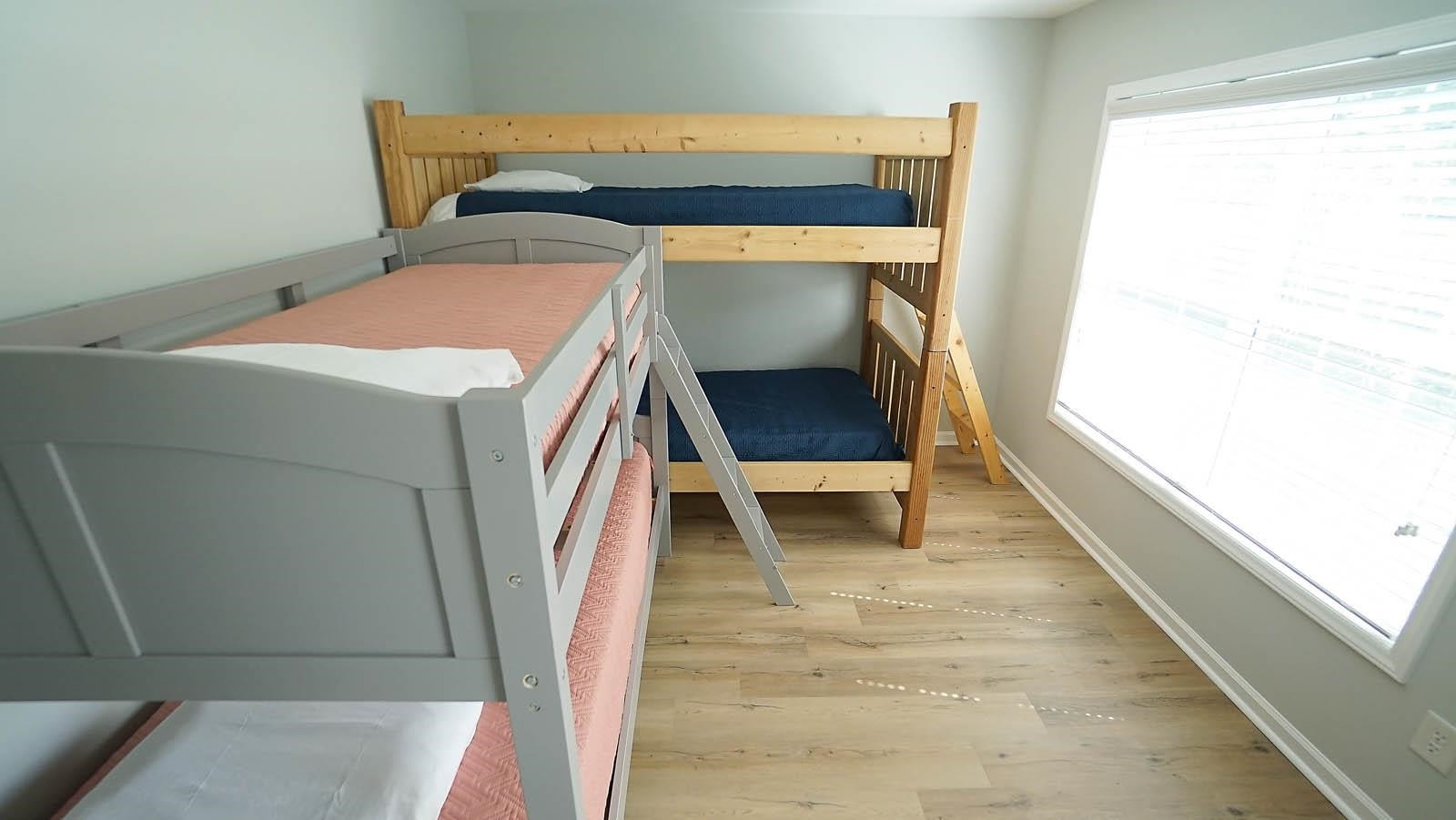 4305 Chimney Stone Road Durham, NC 27704 - Photo 20 of 21 a bedroom with a bed and a window
