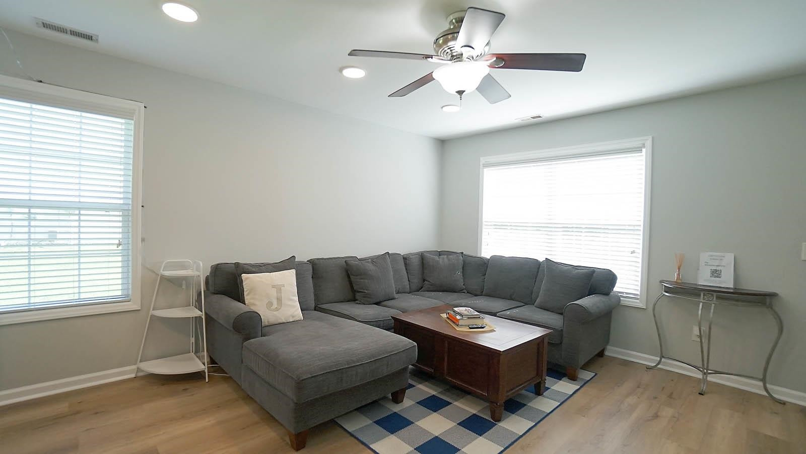 4305 Chimney Stone Road Durham, NC 27704 - Photo 2 of 21 a living room with furniture and a window
