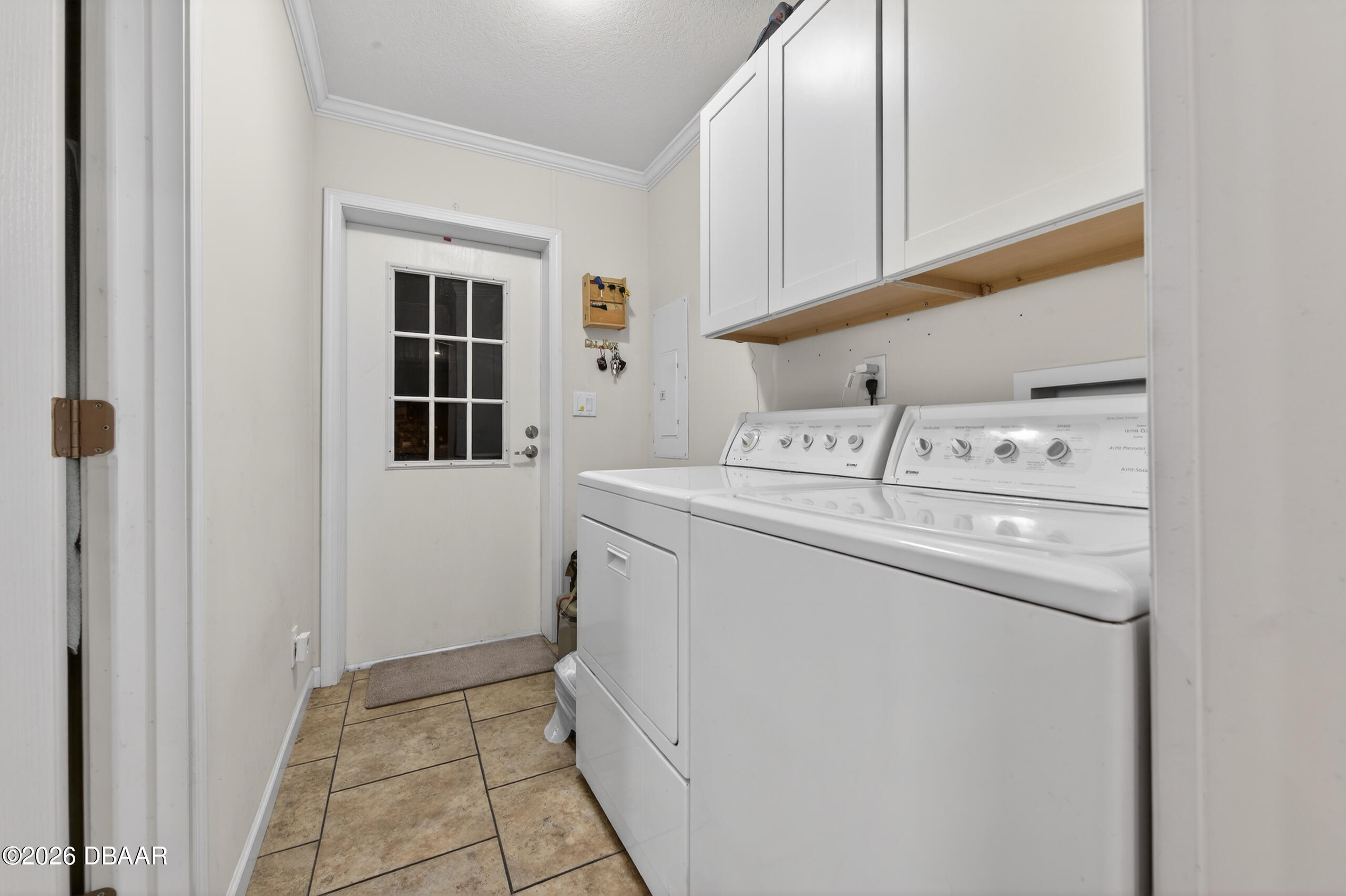 56320 Cherry Tree Road Astor, FL 32102 - Photo 11 of 39 a utility room with dryer and washer