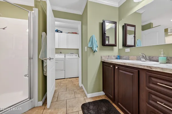 a view of a hallway to rooms