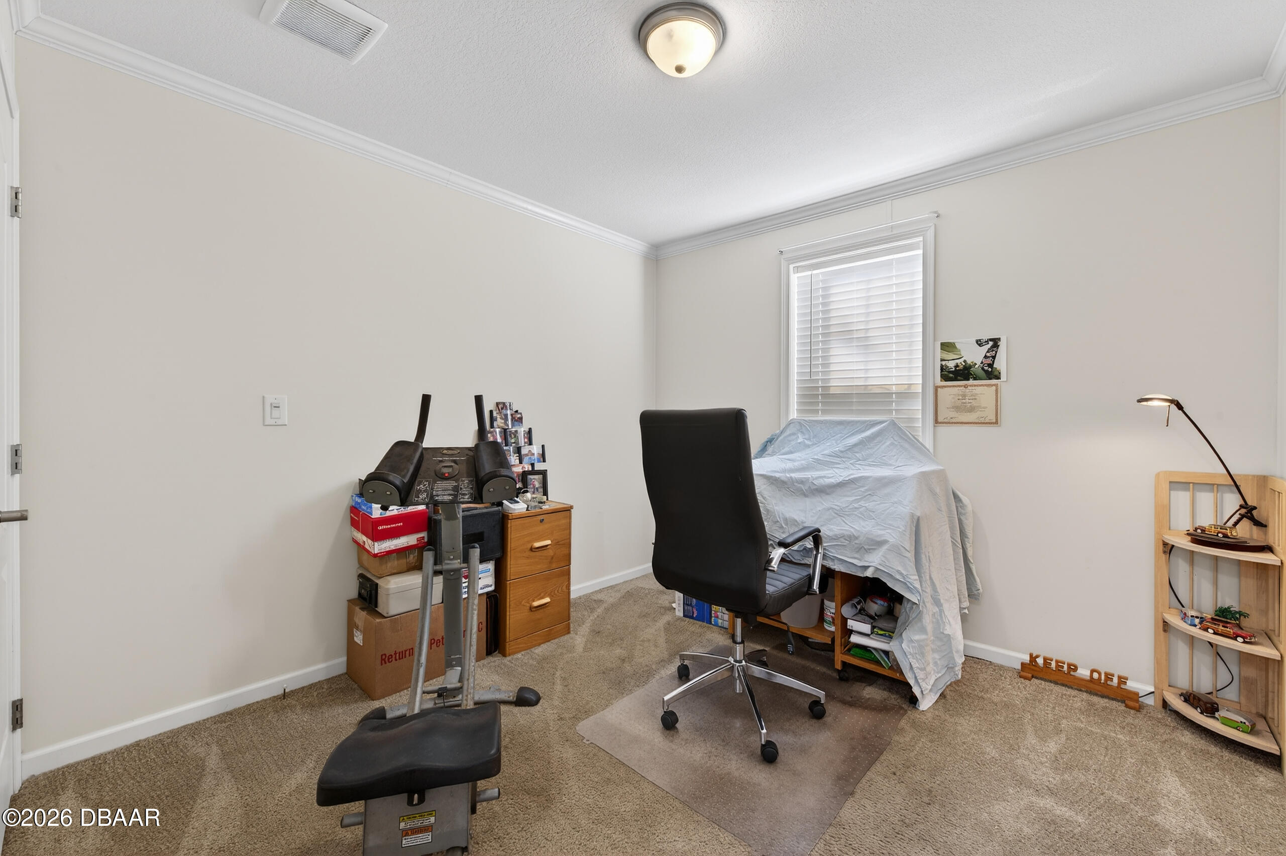 56320 Cherry Tree Road Astor, FL 32102 - Photo 15 of 39 a view of a workspace with furniture and a window