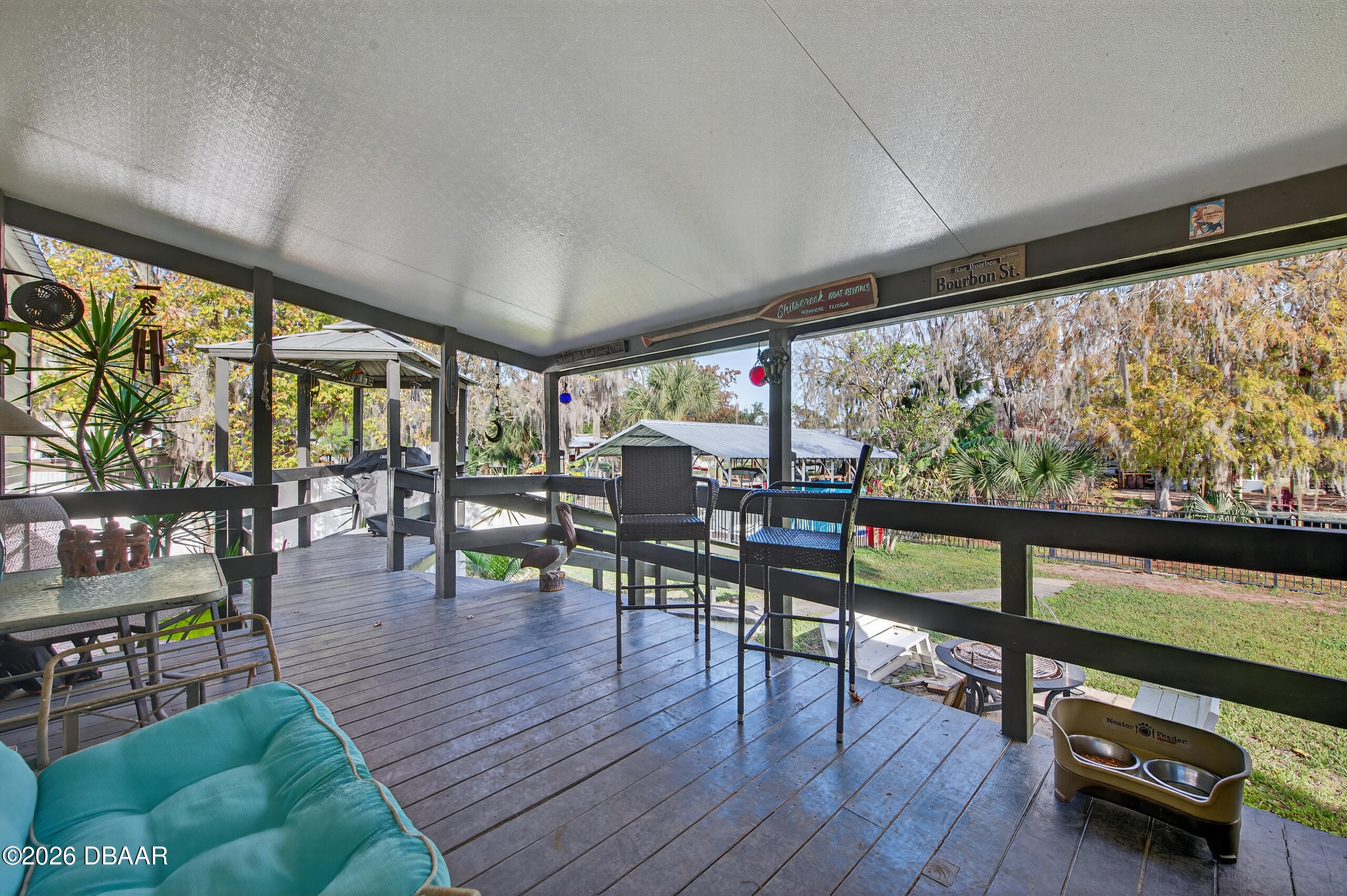56320 Cherry Tree Road Astor, FL 32102 - Photo 39 of 39 a living room with furniture and a large window