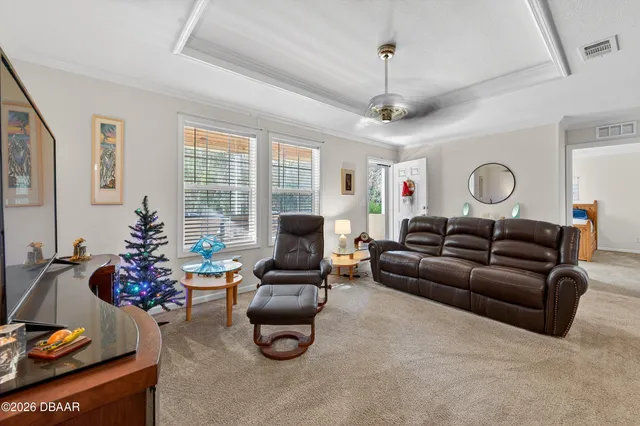 a kitchen with stainless steel appliances granite countertop a sink counter space cabinets and a large window