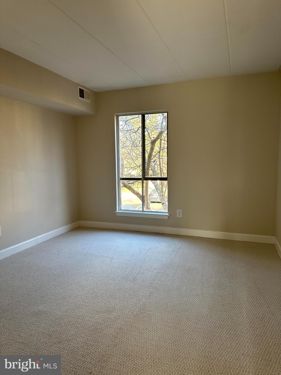2317 Freetown Court, Unit 11C Reston, VA 20191 - Photo 15 of 21 an empty room with a window