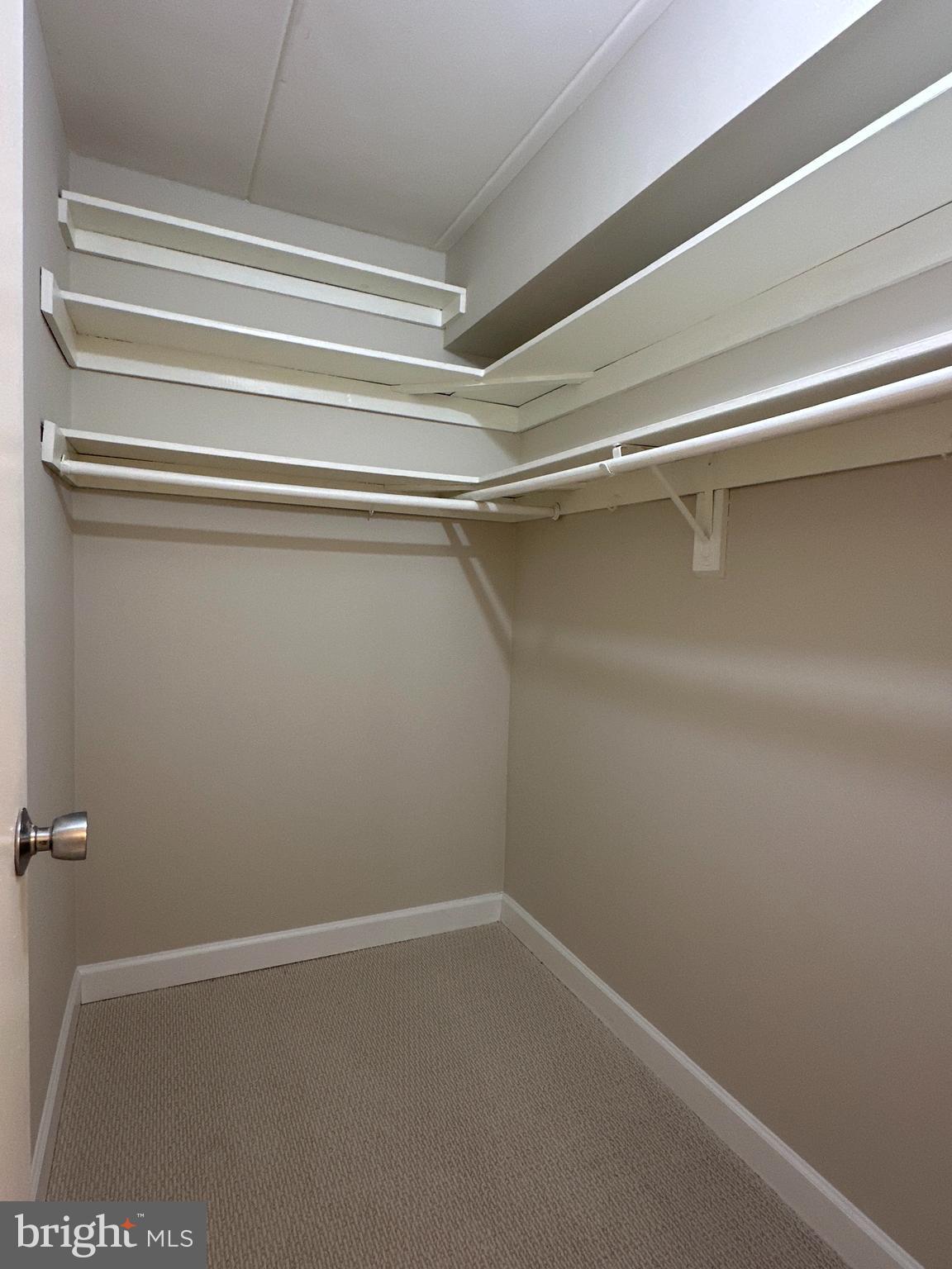2317 Freetown Court, Unit 11C Reston, VA 20191 - Photo 17 of 21 a view of a room with racks on the wall
