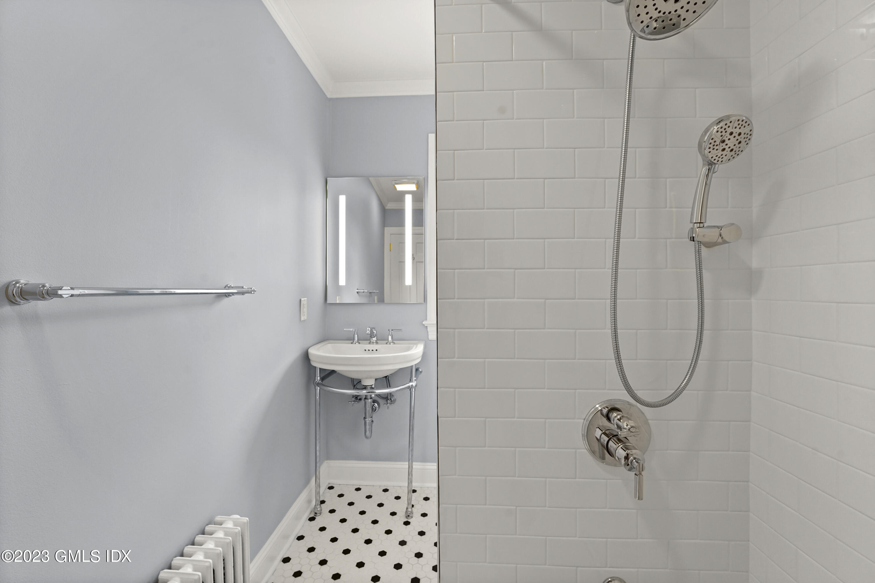 59 Ridge Street, Unit 2 Greenwich, CT 06830 - Photo 17 of 31 a bathroom with a bath tub