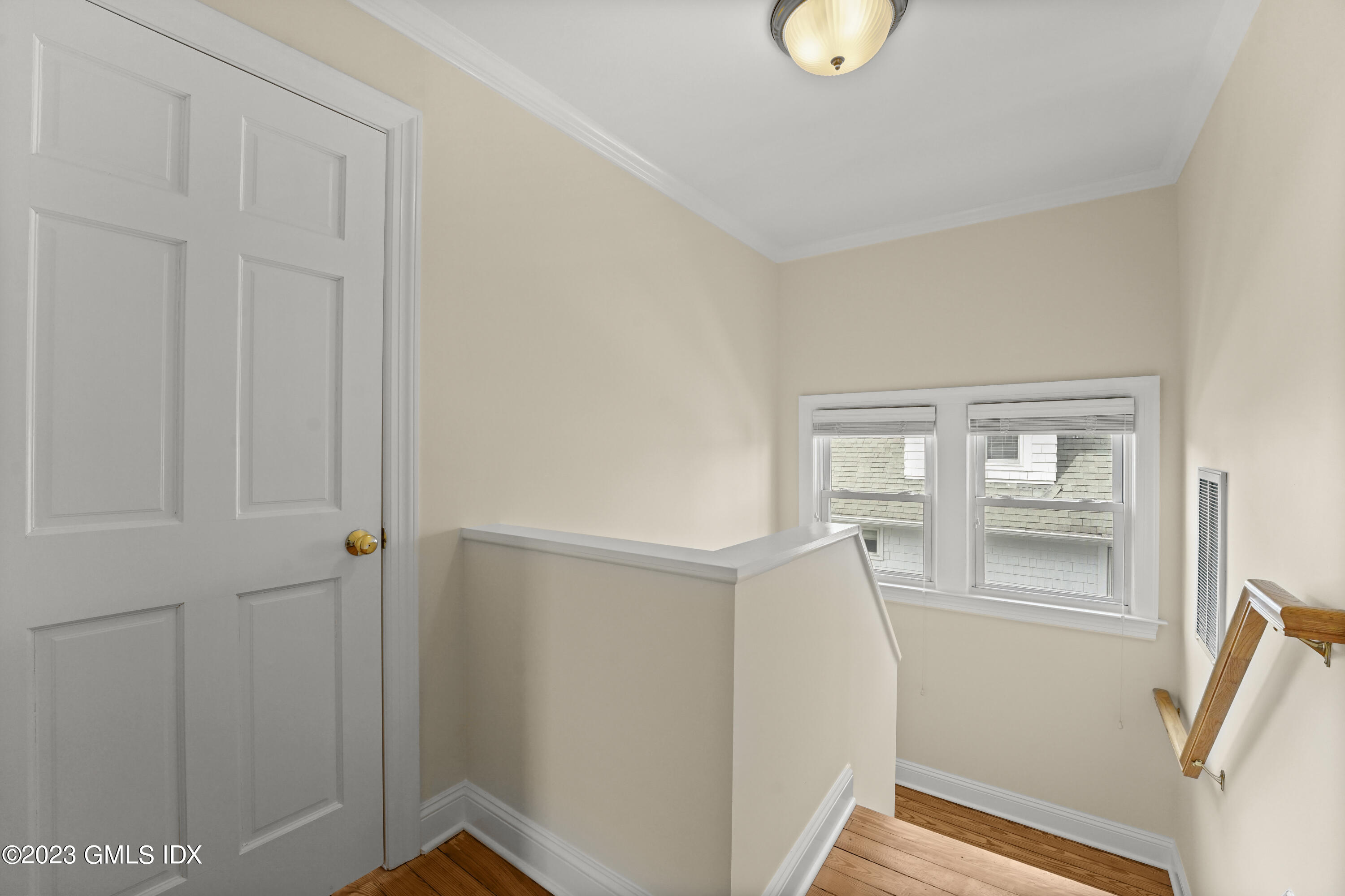 59 Ridge Street, Unit 2 Greenwich, CT 06830 - Photo 20 of 31 a view of an entryway with wooden floor