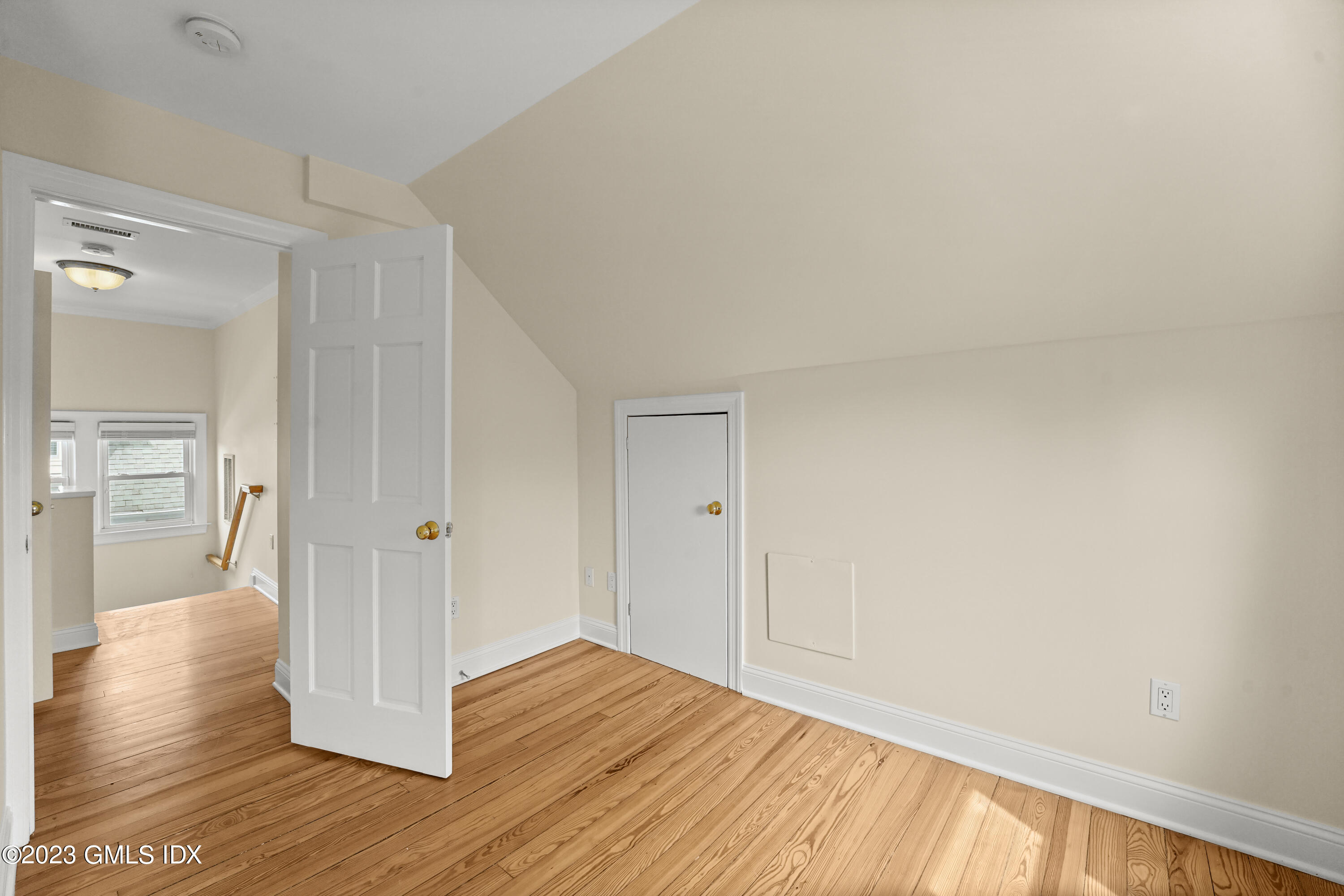 59 Ridge Street, Unit 2 Greenwich, CT 06830 - Photo 25 of 31 a view of a room with wooden floor