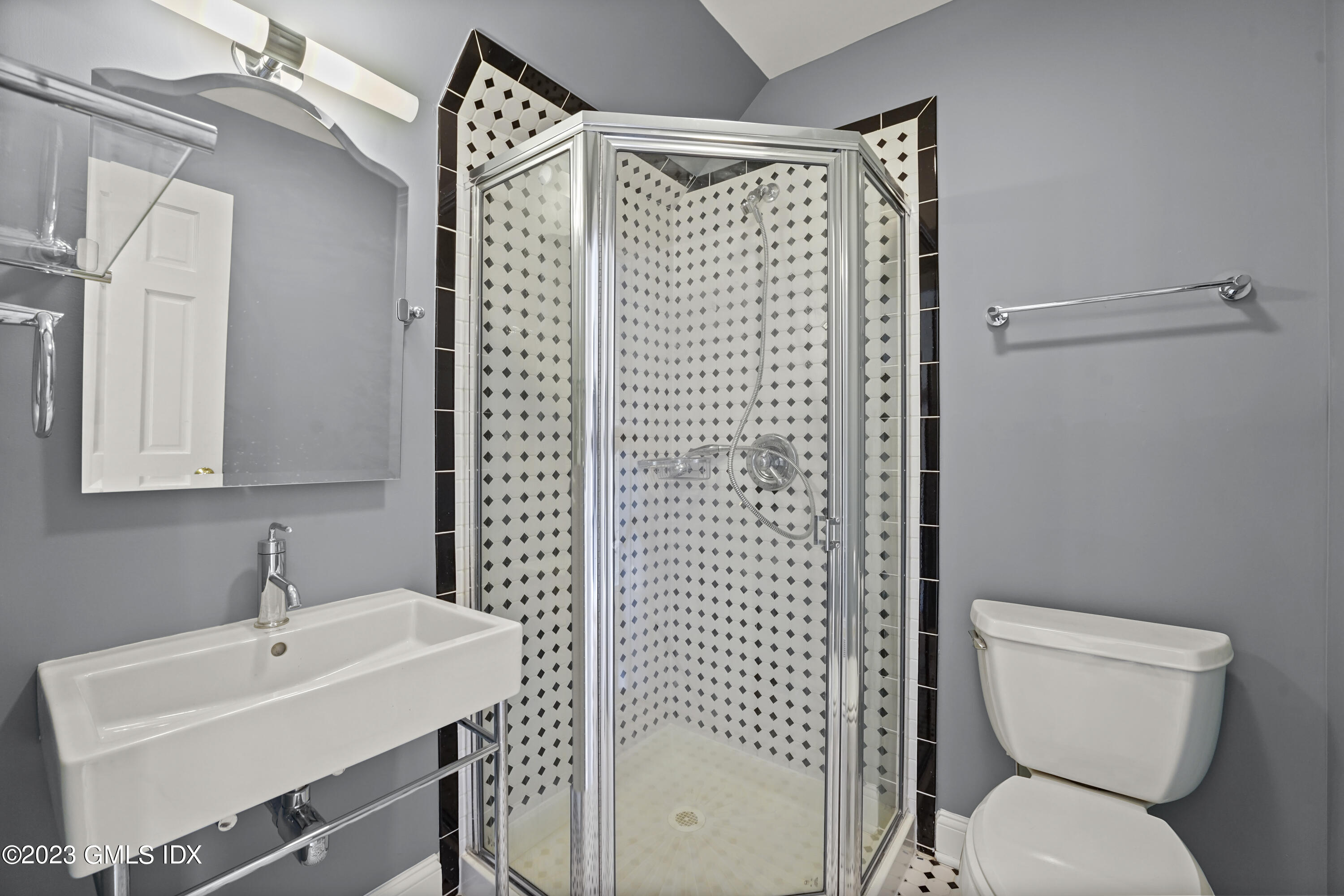 59 Ridge Street, Unit 2 Greenwich, CT 06830 - Photo 26 of 31 a bathroom with a toilet sink and shower