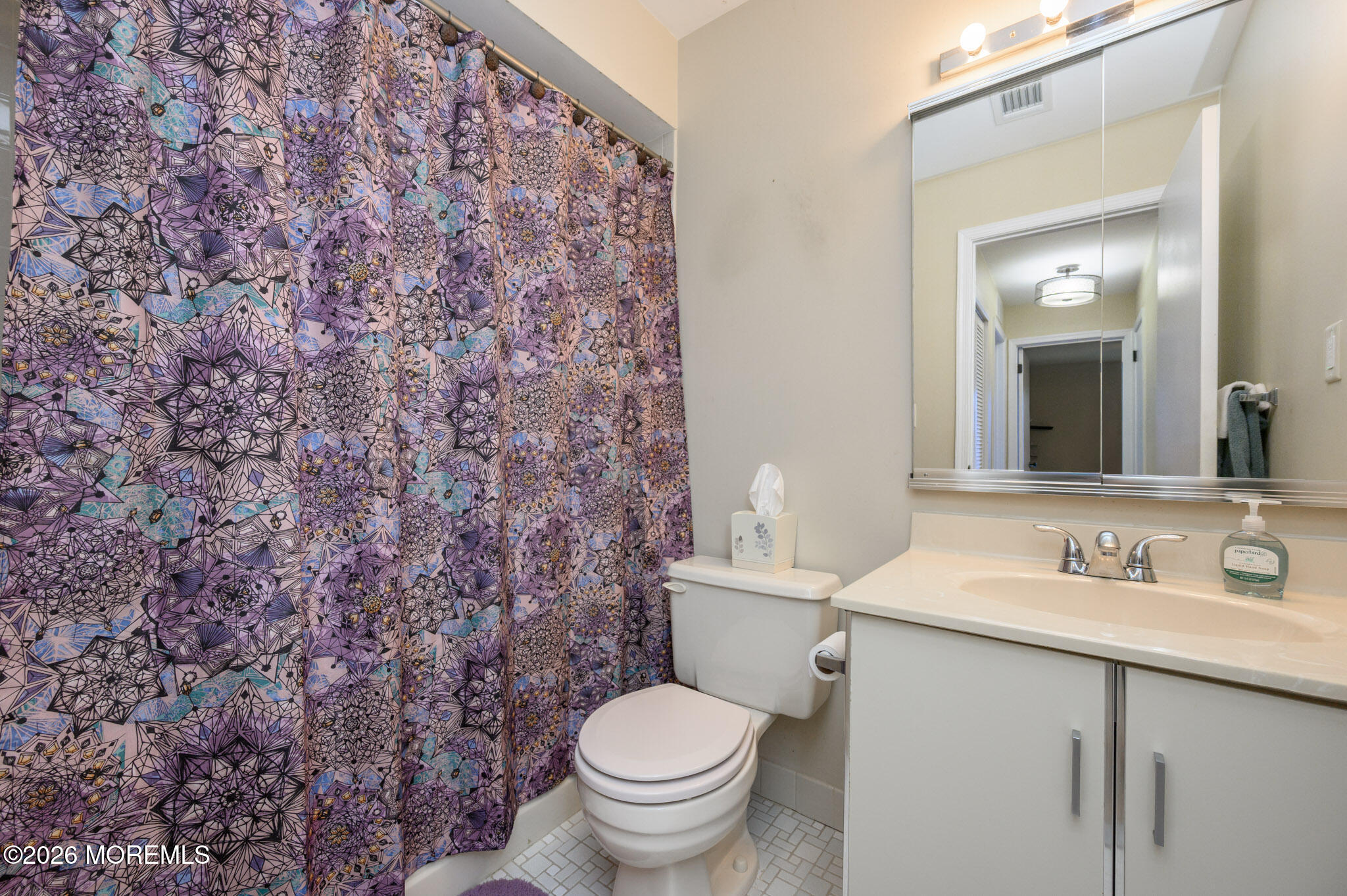 182 Edinburgh Court Matawan, NJ 07747 - Photo 14 of 24 a bathroom with a granite countertop toilet and a sink