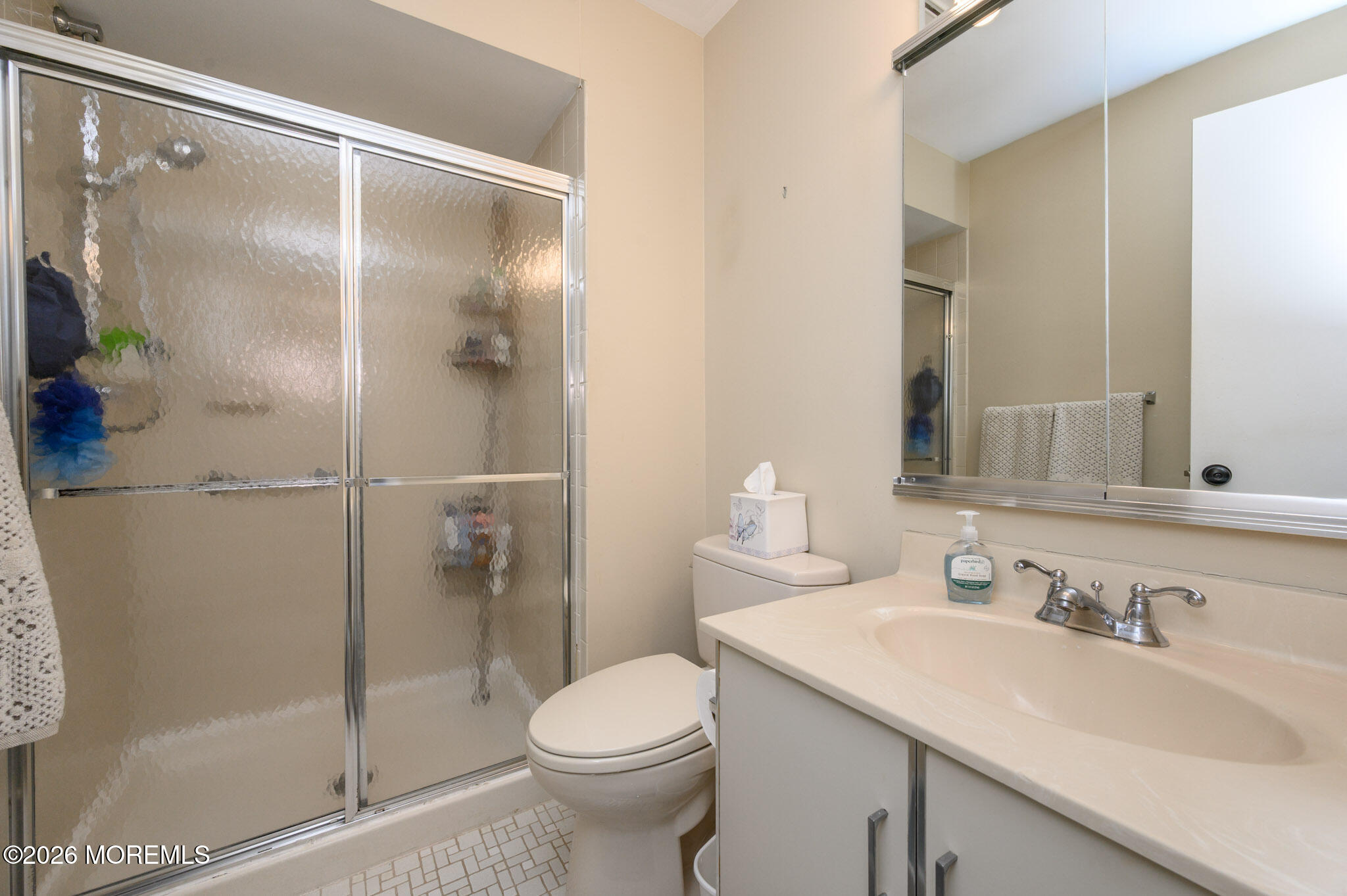 182 Edinburgh Court Matawan, NJ 07747 - Photo 19 of 24 a bathroom with a sink toilet and shower