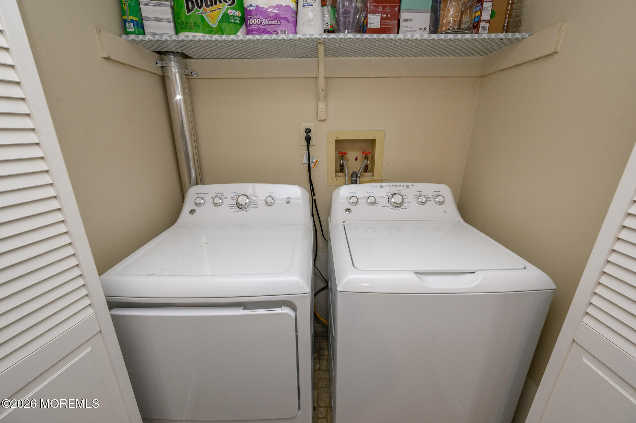 182 Edinburgh Court Matawan, NJ 07747 - Photo 20 of 24 a utility room with dryer and washer