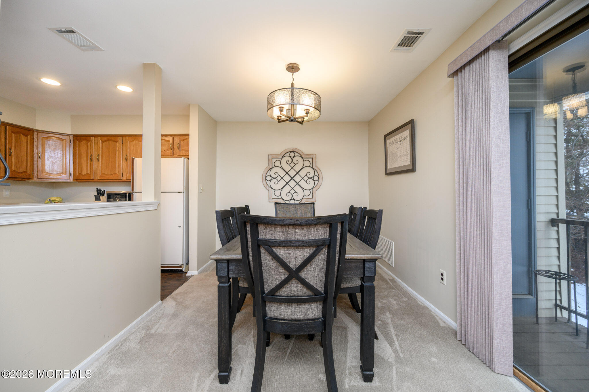 182 Edinburgh Court Matawan, NJ 07747 - Photo 8 of 24 a view of a dining room with furniture
