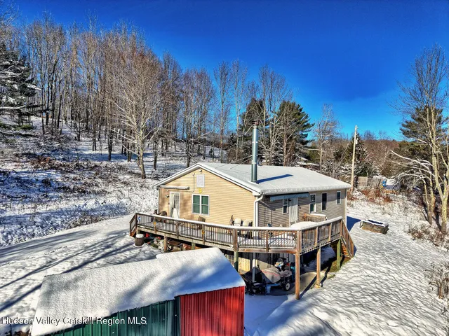 a house with trees in front of it