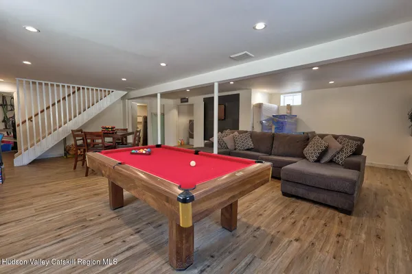 a bedroom with a bed and a table