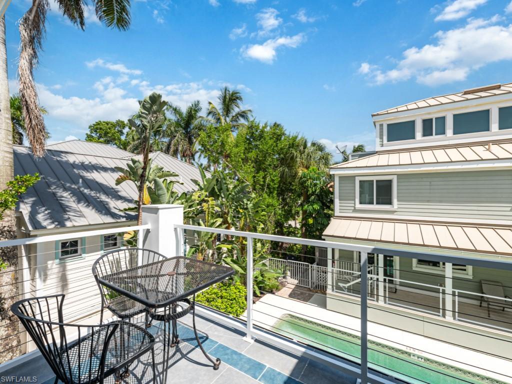 640 2nd Street South, Unit 2 Naples, FL 34102 - Photo 14 of 24 Primary bedroom balcony
