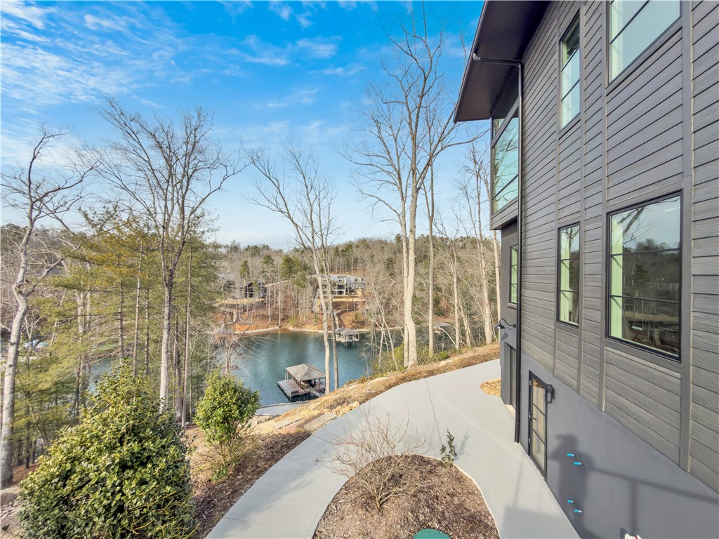 127 Crosswind Court Sunset, SC 29685 - Photo 39 of 49 This modern lakeside residence offers serene water views and direct access to outdoor recreation.