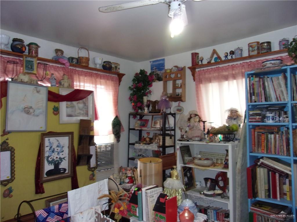 700 Doherty Avenue Mission, TX 78572 - Photo 7 of 7 a view of walk in closet with clothes and shoes