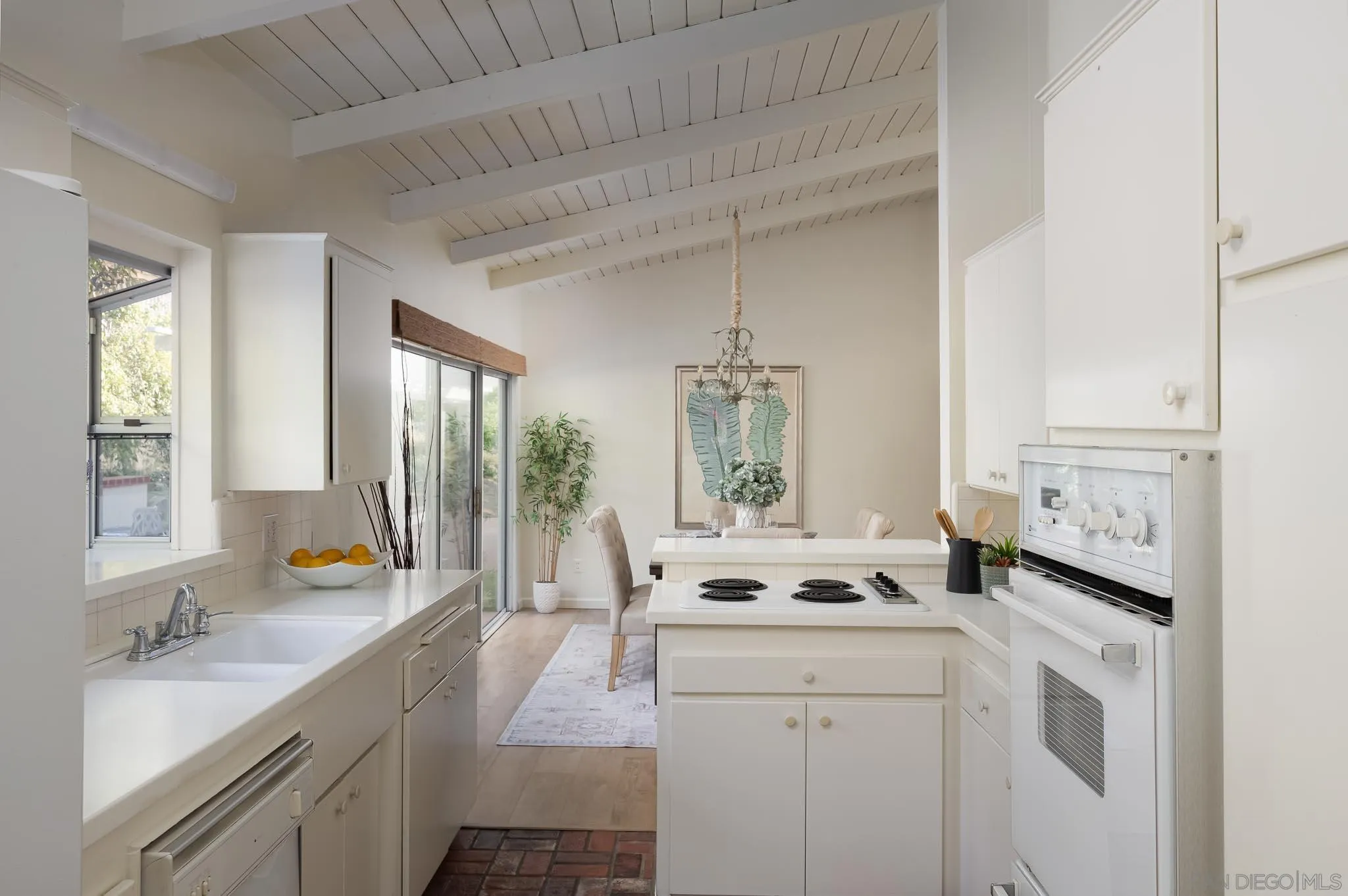 13404 Stone Canyon Road Poway, CA 92064 - Photo 12 of 42 a view of utility room and bedroom with windows