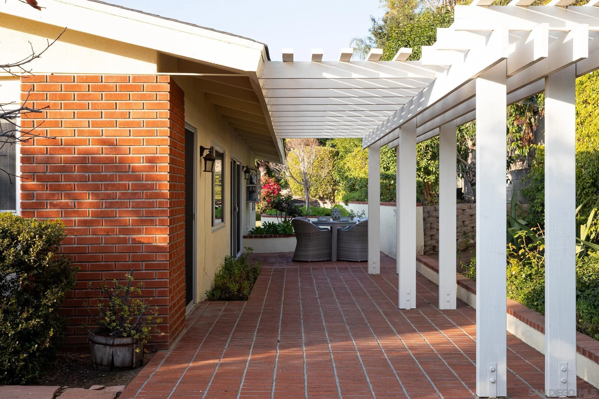 13404 Stone Canyon Road Poway, CA 92064 - Photo 27 of 42 a view of a balcony with chairs and potted plants
