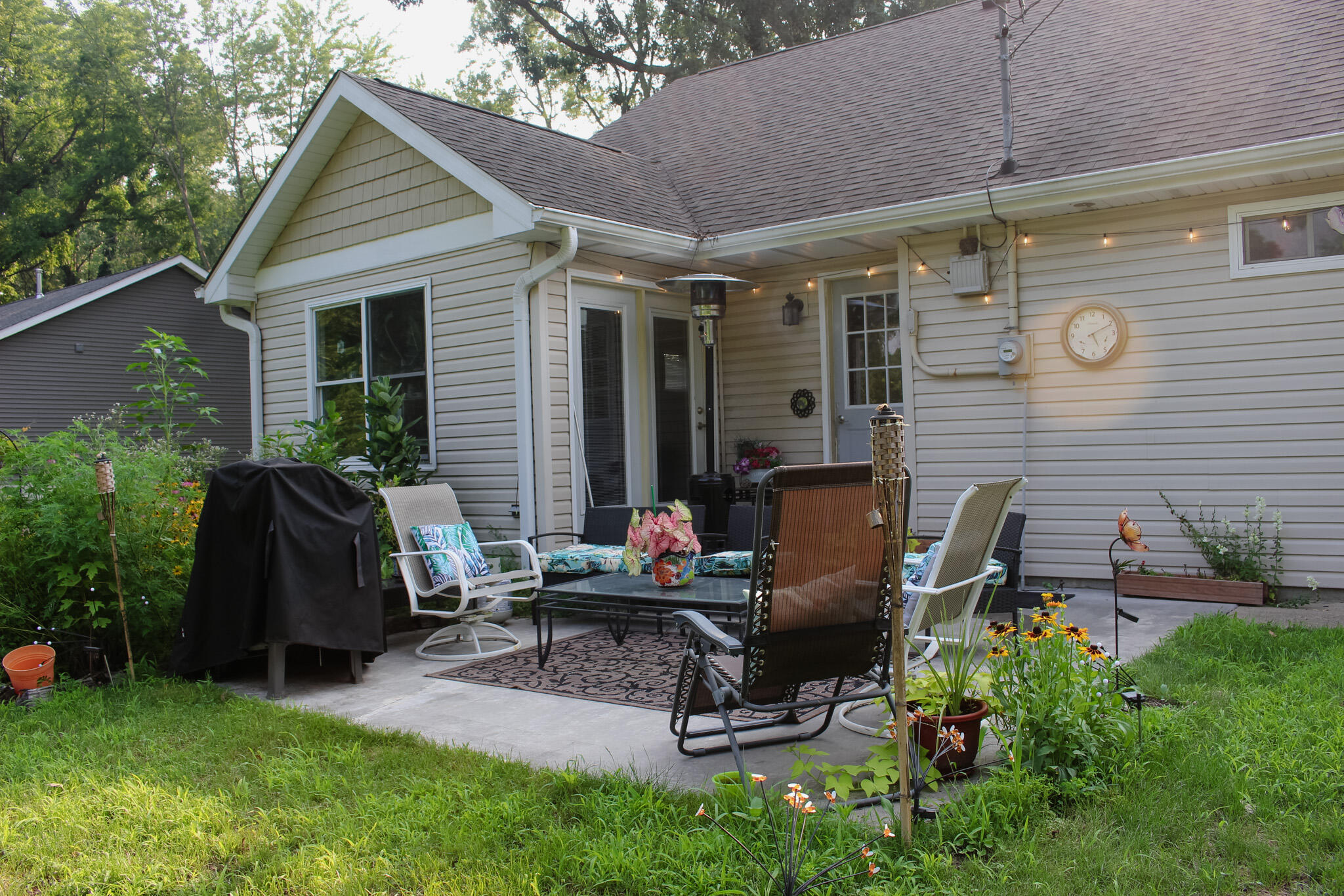 2819 Bryant Street Portage, IN 46368 - Photo 22 of 24 a view of backyard with outdoor seating and plants