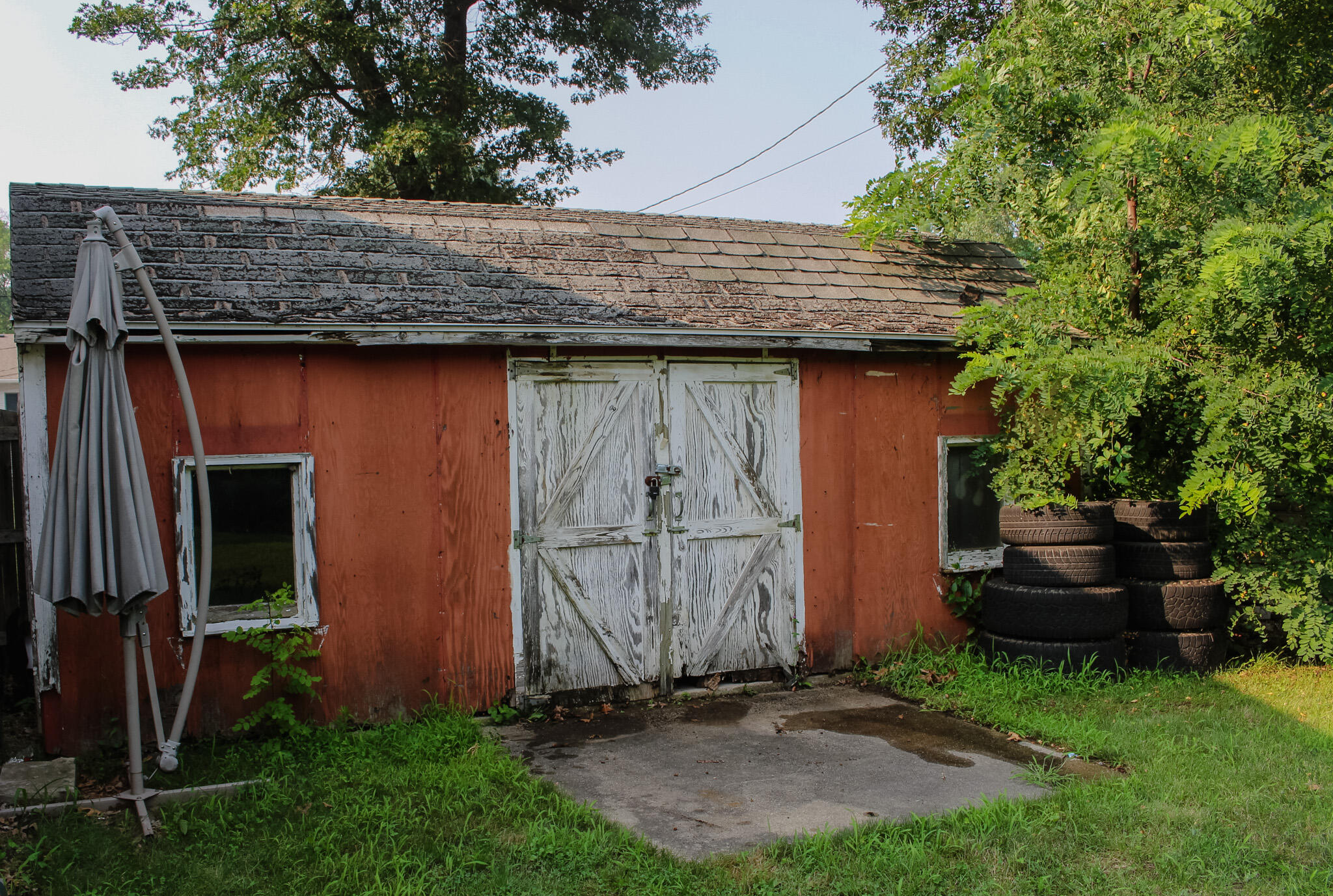 2819 Bryant Street Portage, IN 46368 - Photo 24 of 24 a backyard of a house with barbeque oven
