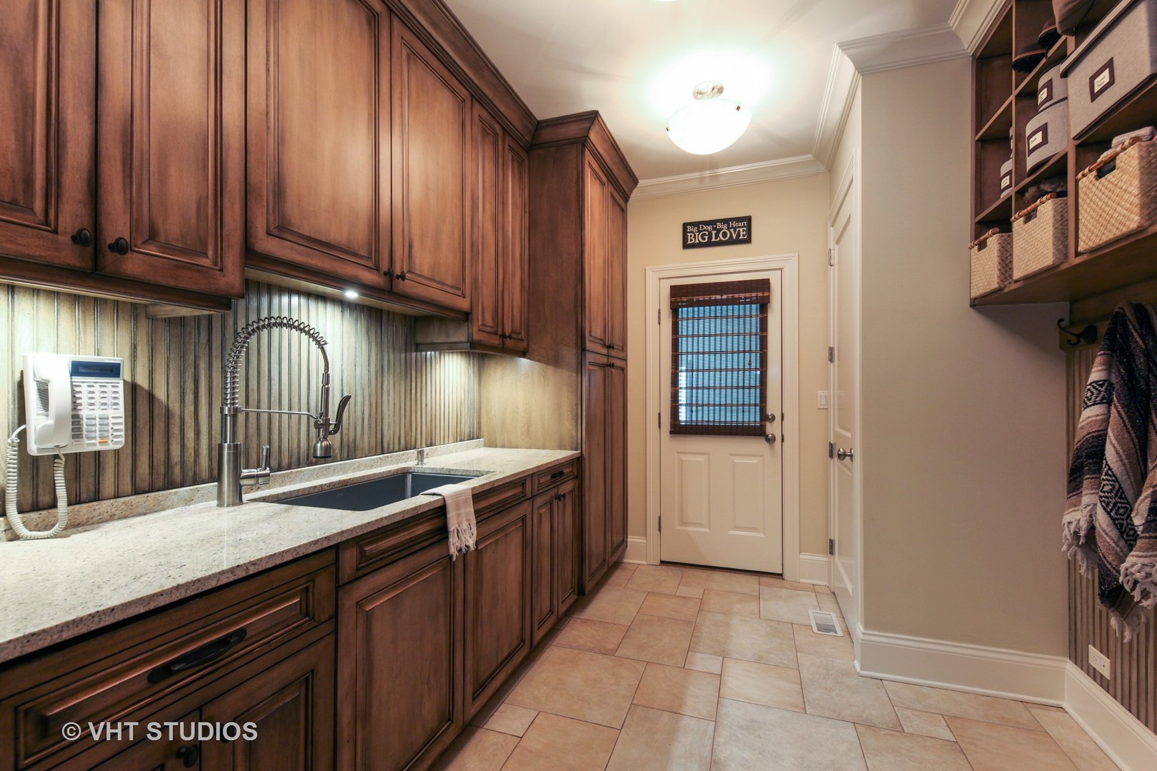 1536 Voltz Road Northbrook, IL 60062 - Photo 15 of 50 a kitchen with stainless steel appliances granite countertop a sink stove and cabinets