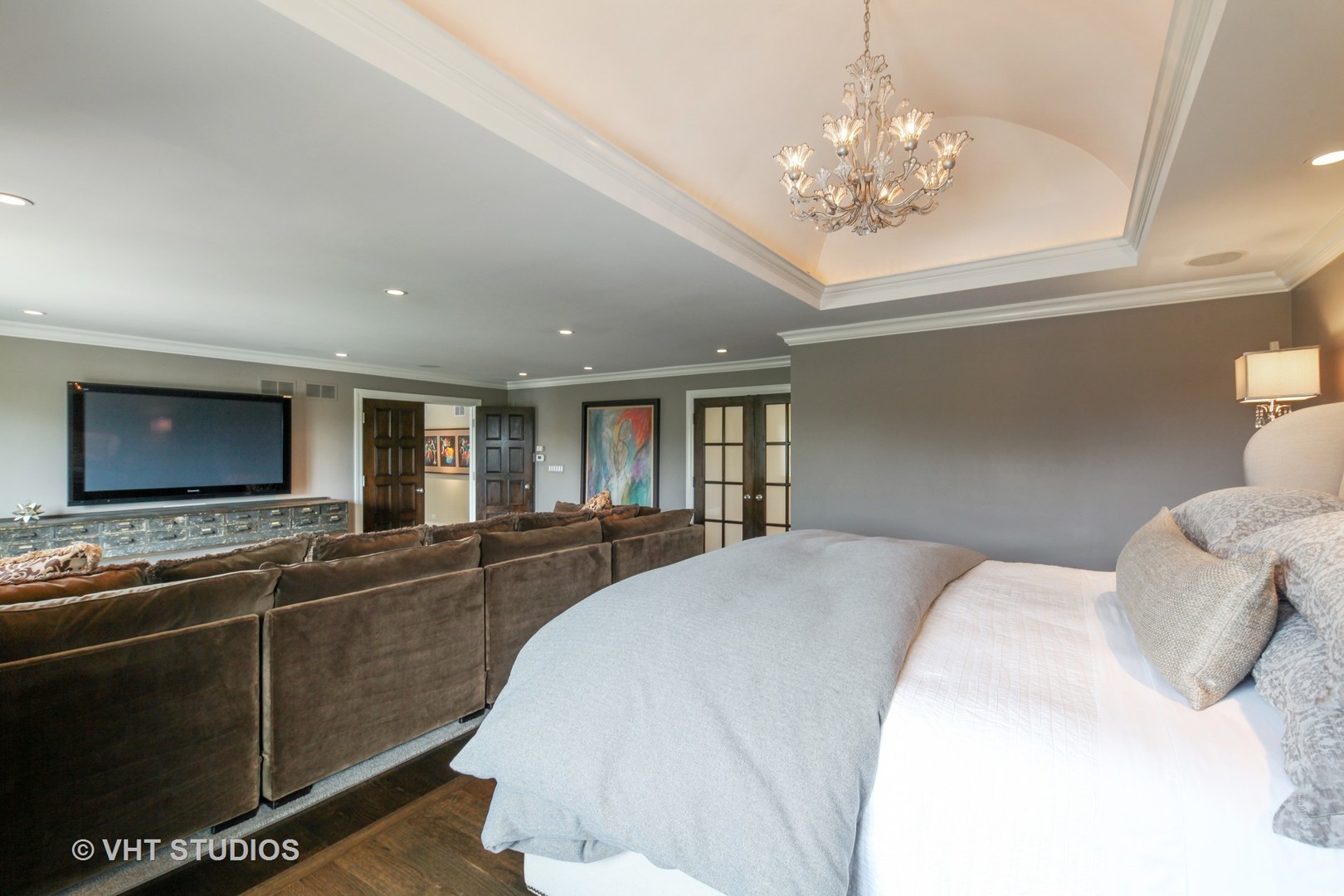 1536 Voltz Road Northbrook, IL 60062 - Photo 19 of 50 a spacious bedroom with bed and a chandelier