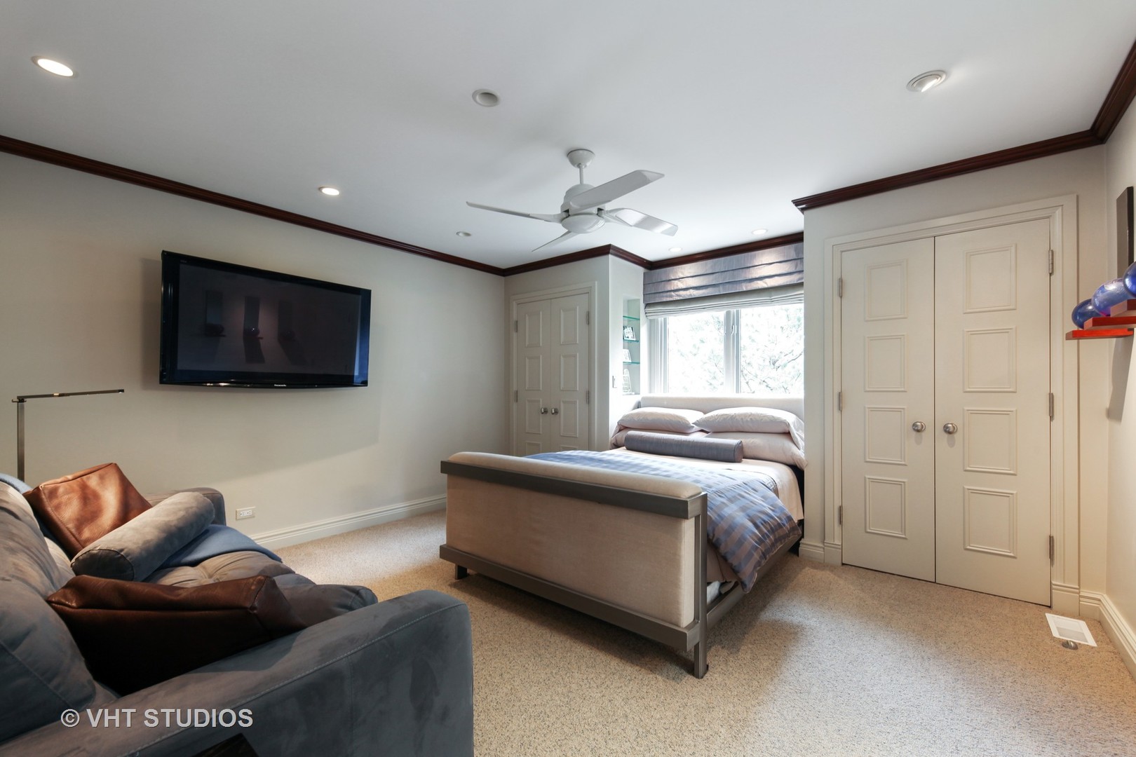 1536 Voltz Road Northbrook, IL 60062 - Photo 26 of 50 a spacious bedroom with a bed and a flat screen television