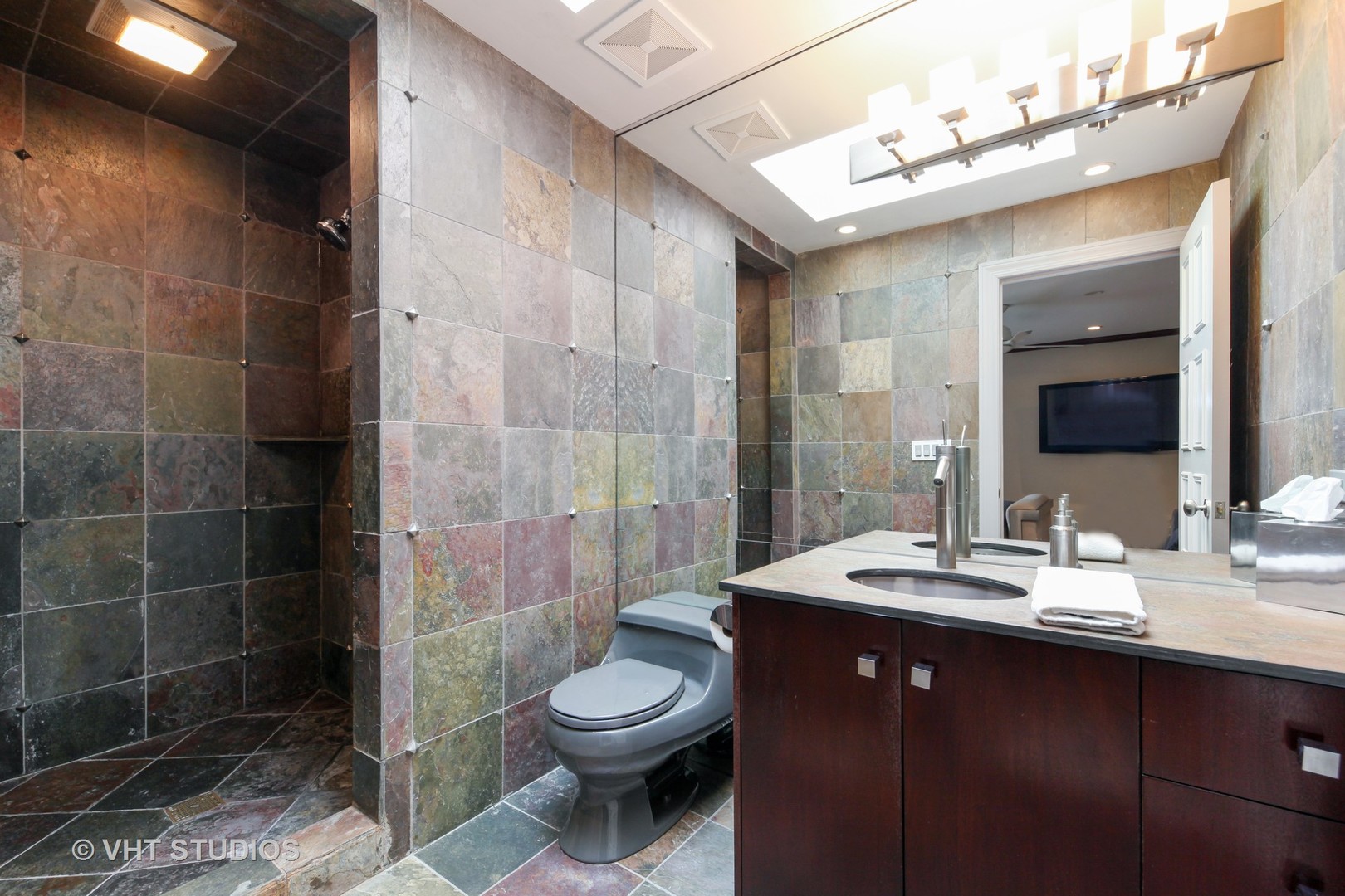 1536 Voltz Road Northbrook, IL 60062 - Photo 29 of 50 a bathroom with a sink a toilet and shower