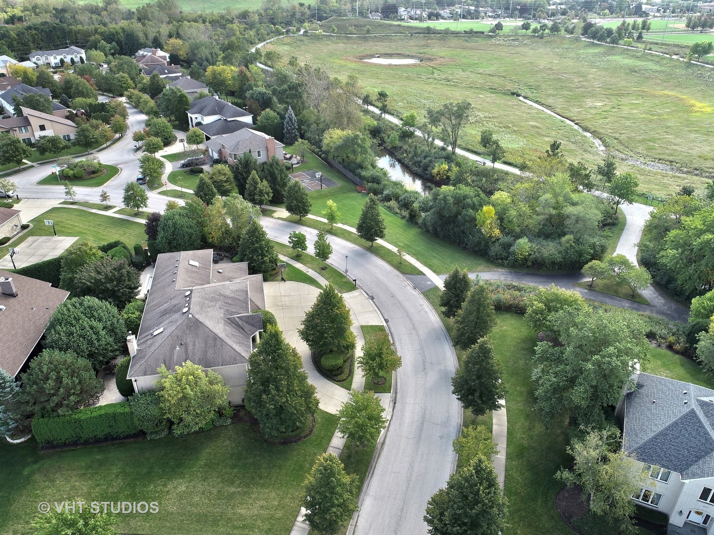 1536 Voltz Road Northbrook, IL 60062 - Photo 43 of 50 an aerial view of residential houses with outdoor space and swimming pool